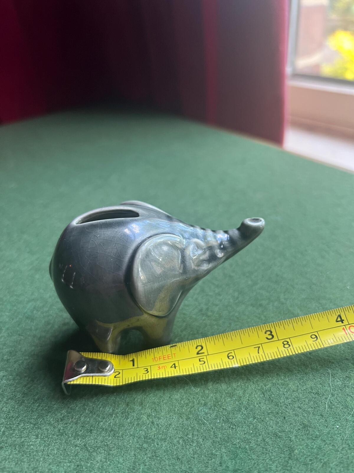 Tiny ceramic elephant planter. Lucky trunk up elephant figurine.