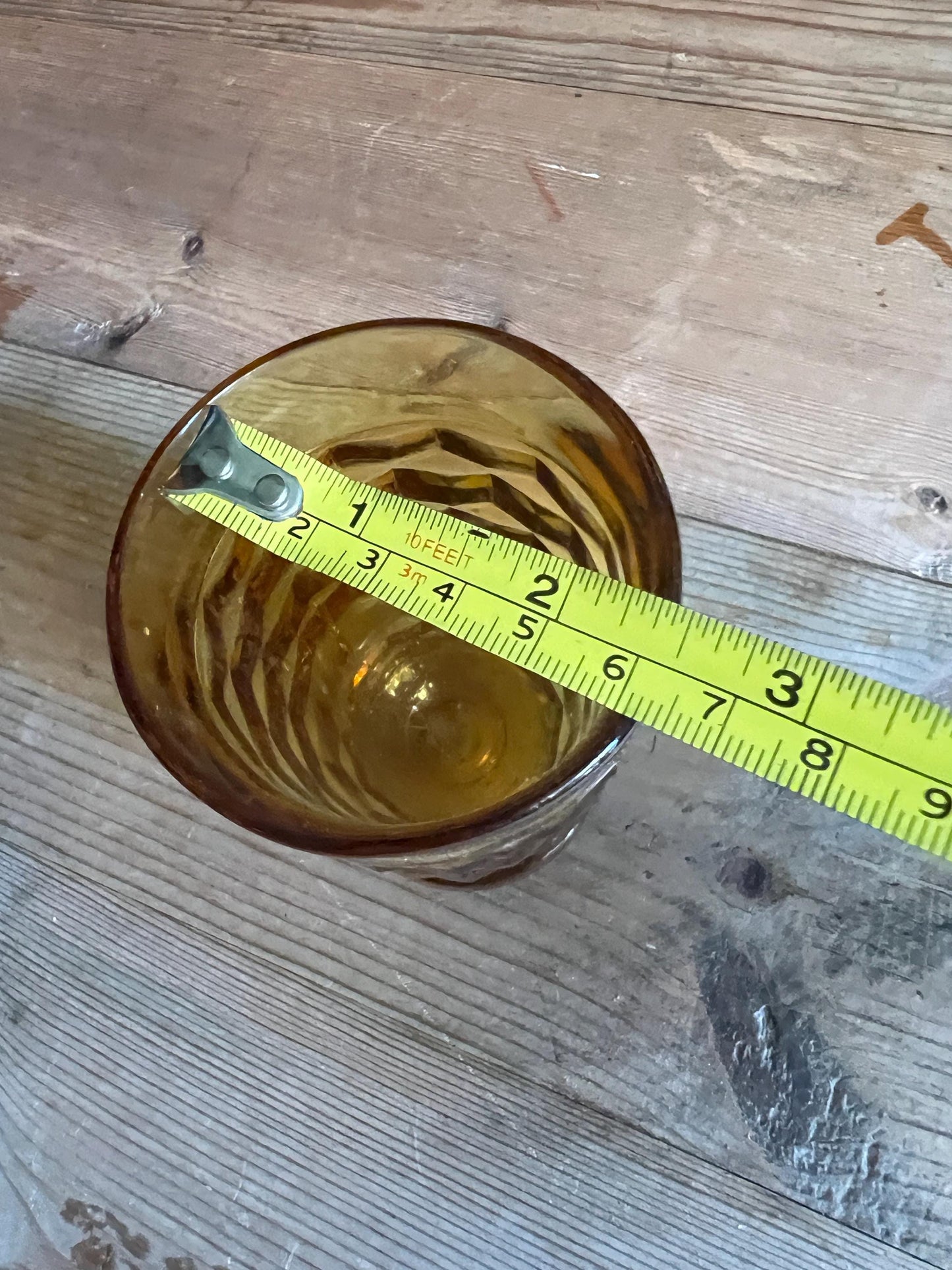Vintage footed tumbler. Indiana Whitehall Amber glass cubist design drink ware.