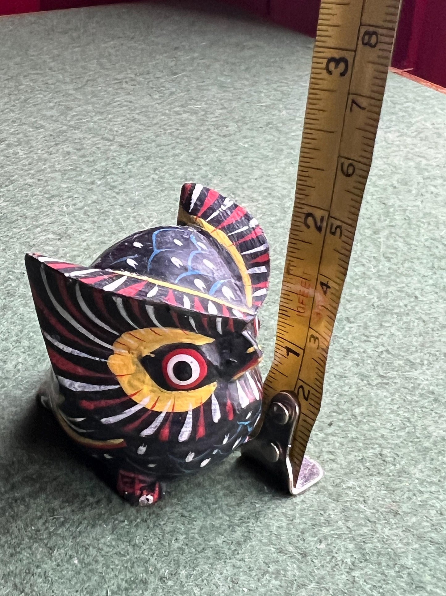 Hand painted colourful owlet ornament.