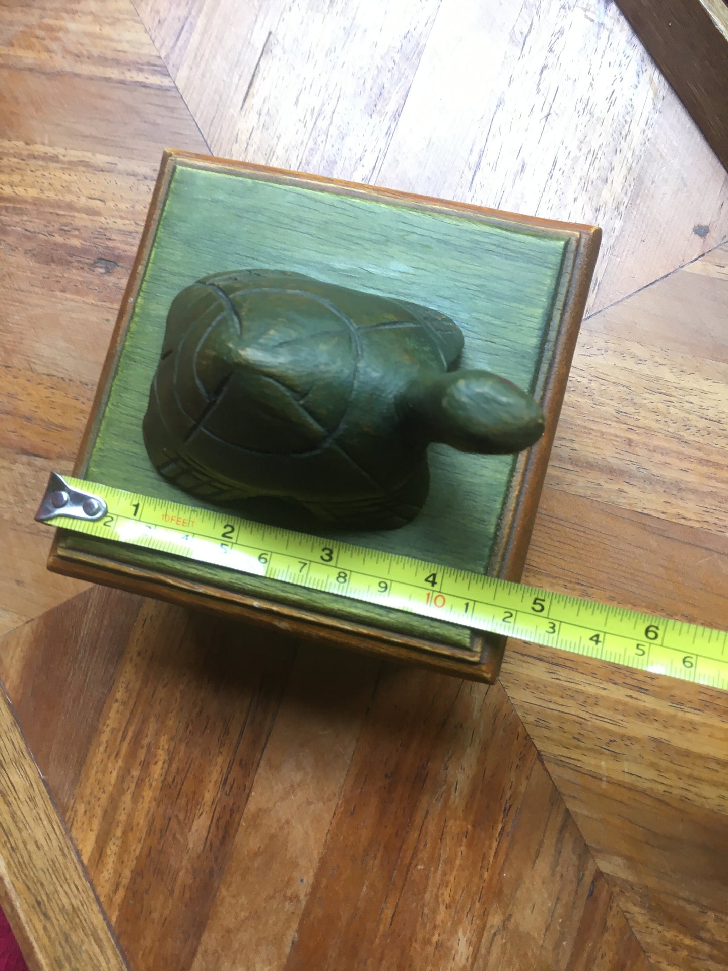 Hand-carved tortoise-lidded square wooden box. Made in Thailand.