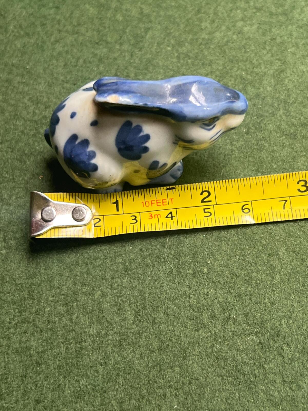 Miniature rabbit figurine. Blue white Delft style ceramic bunny.