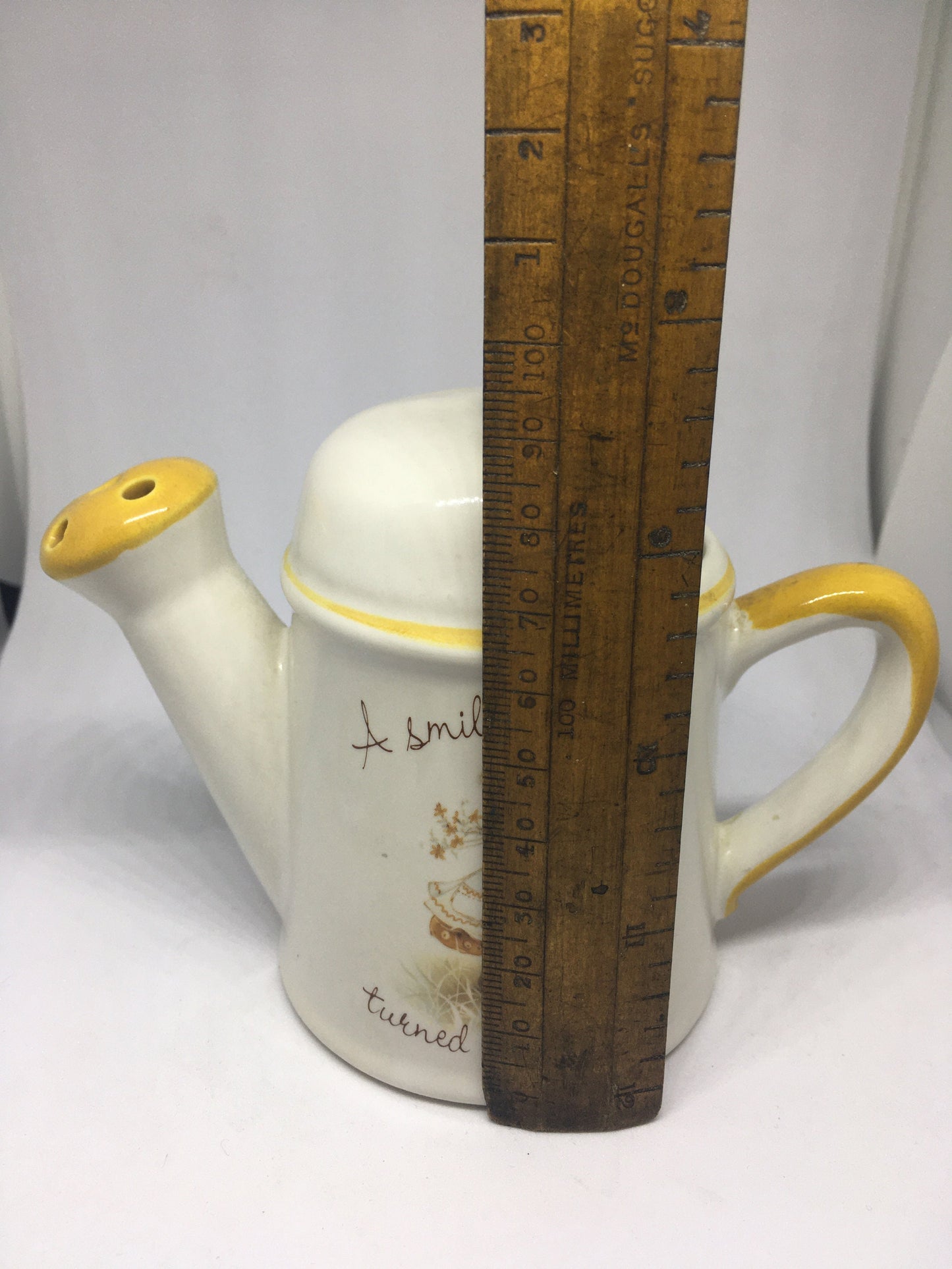 Ceramic watering can Vintage Gretchen Stoneware ceramic watering can ornament. 1970s kitsch. A smile is a frown turned upside down.