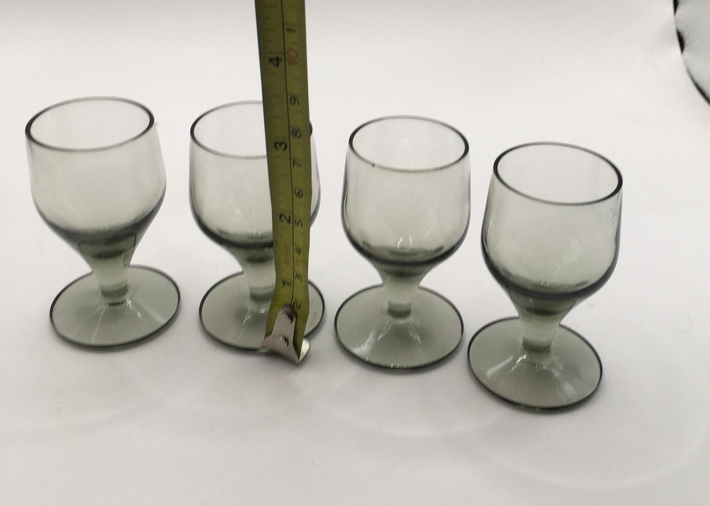 Set of 4 smoky grey sherry port glasses. Mid Century Modern Bar ware.