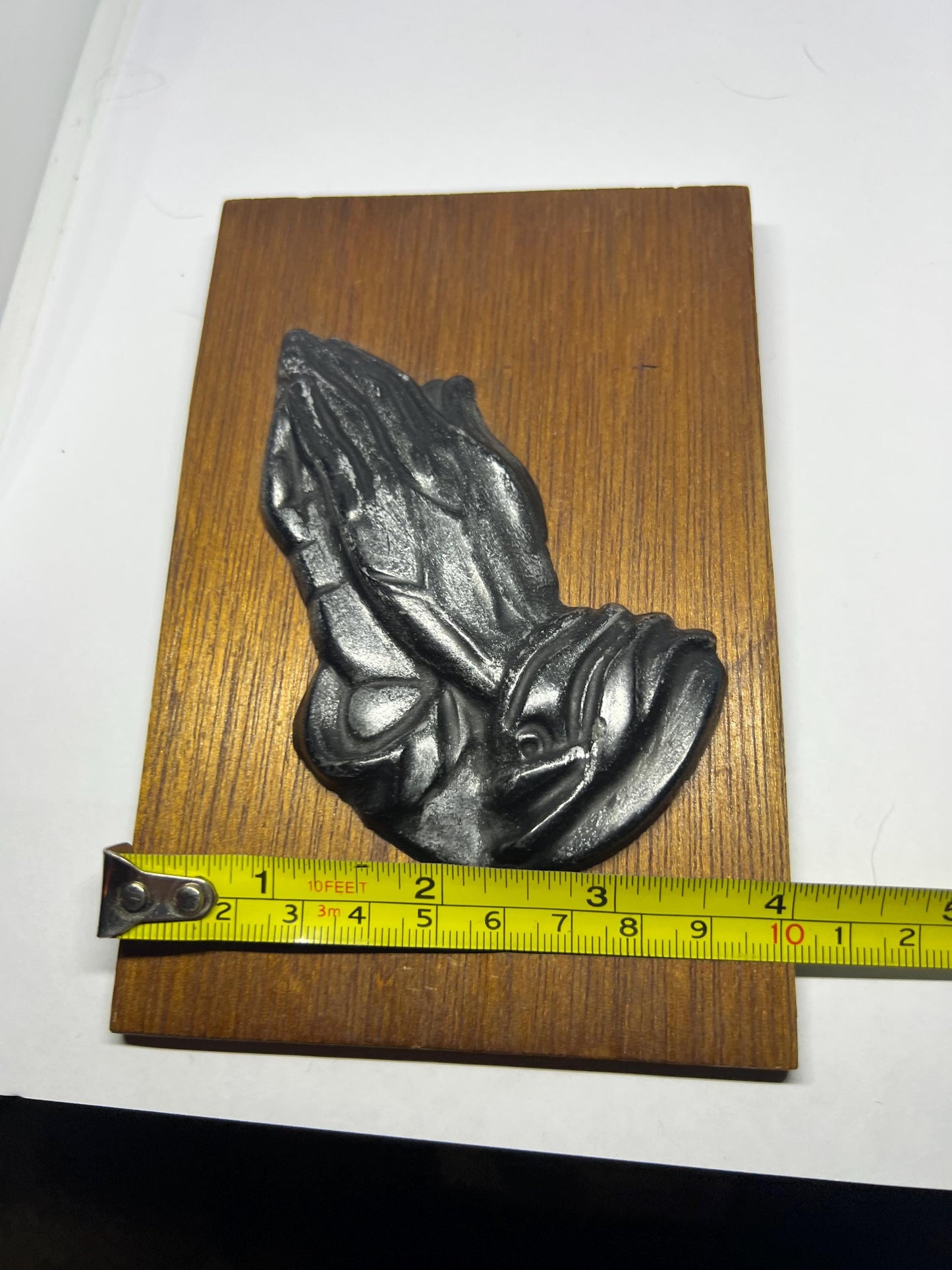 Praying Hand plaque. Kelham Crafts New Life Foundation Trust Newark Notts Uk.