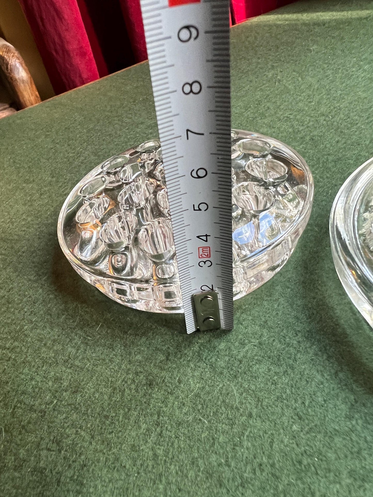 Vintage clear glass flower frogs. 2 available Sold separately.
