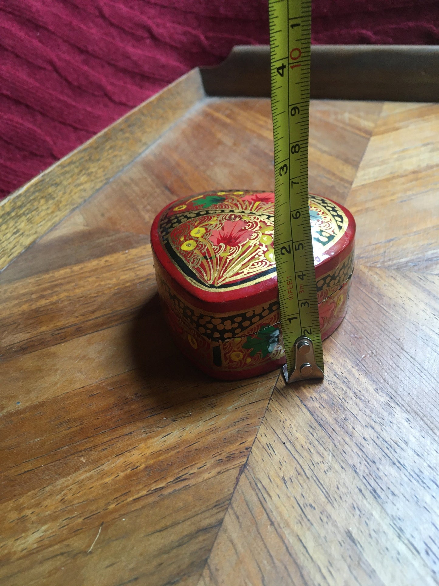 Beautiful hand-painted heart shaped lidded box.
