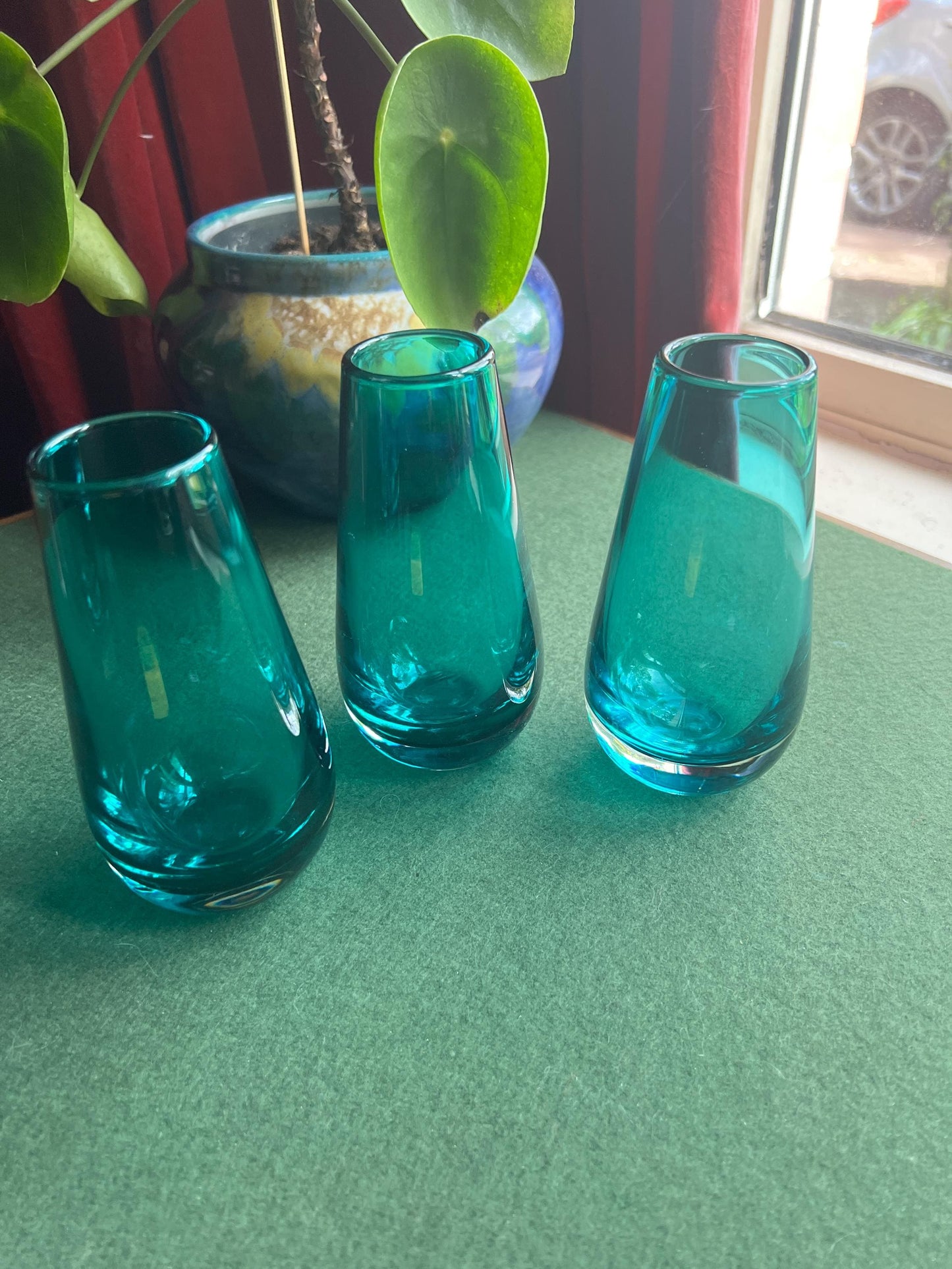 Beautiful teal blue hand blown glass posy vase. 3 available Sold separately