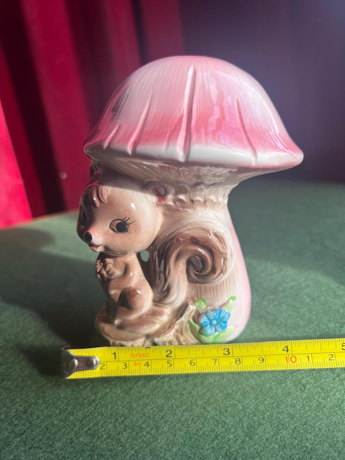 Quirky Squirrel money bank. Kitsch anthropomorphic squirrel sitting under a pink mushroom. MC decor.