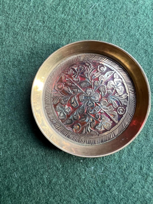 Decorative brass trinket tray. Engraved intricate red pattern. Made in India.