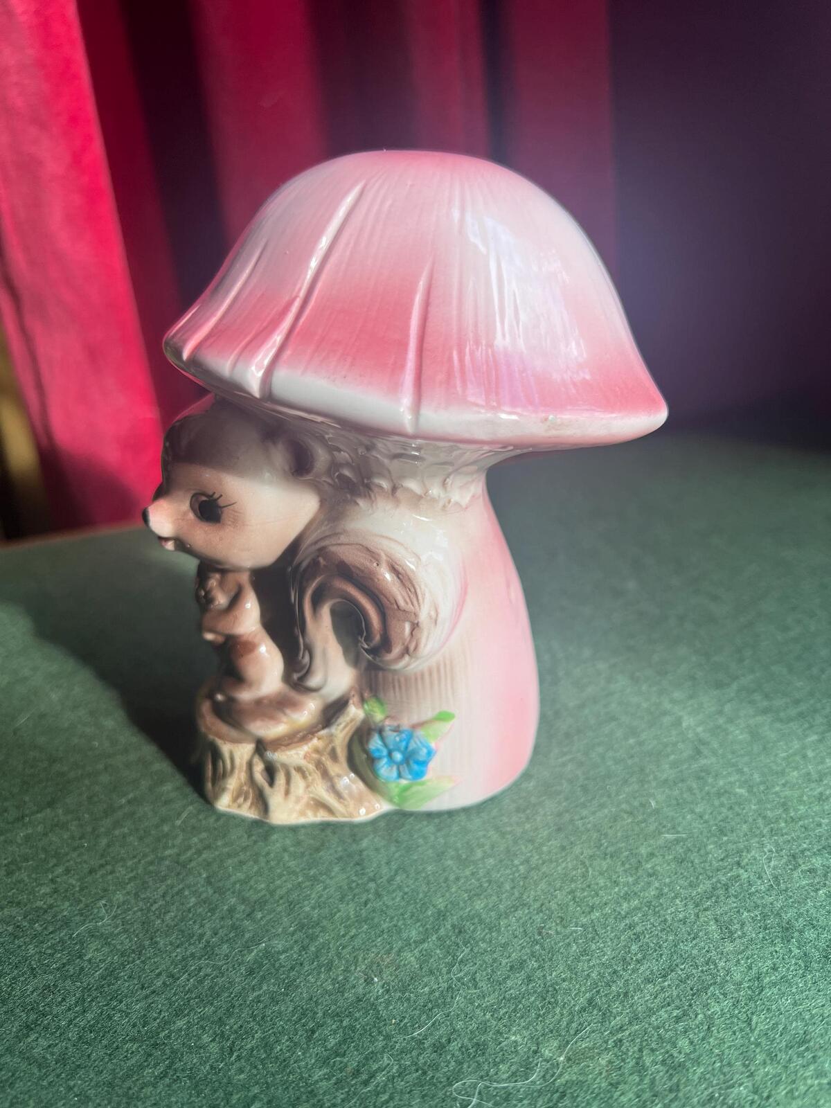 Quirky Squirrel money bank. Kitsch anthropomorphic squirrel sitting under a pink mushroom. MC decor.