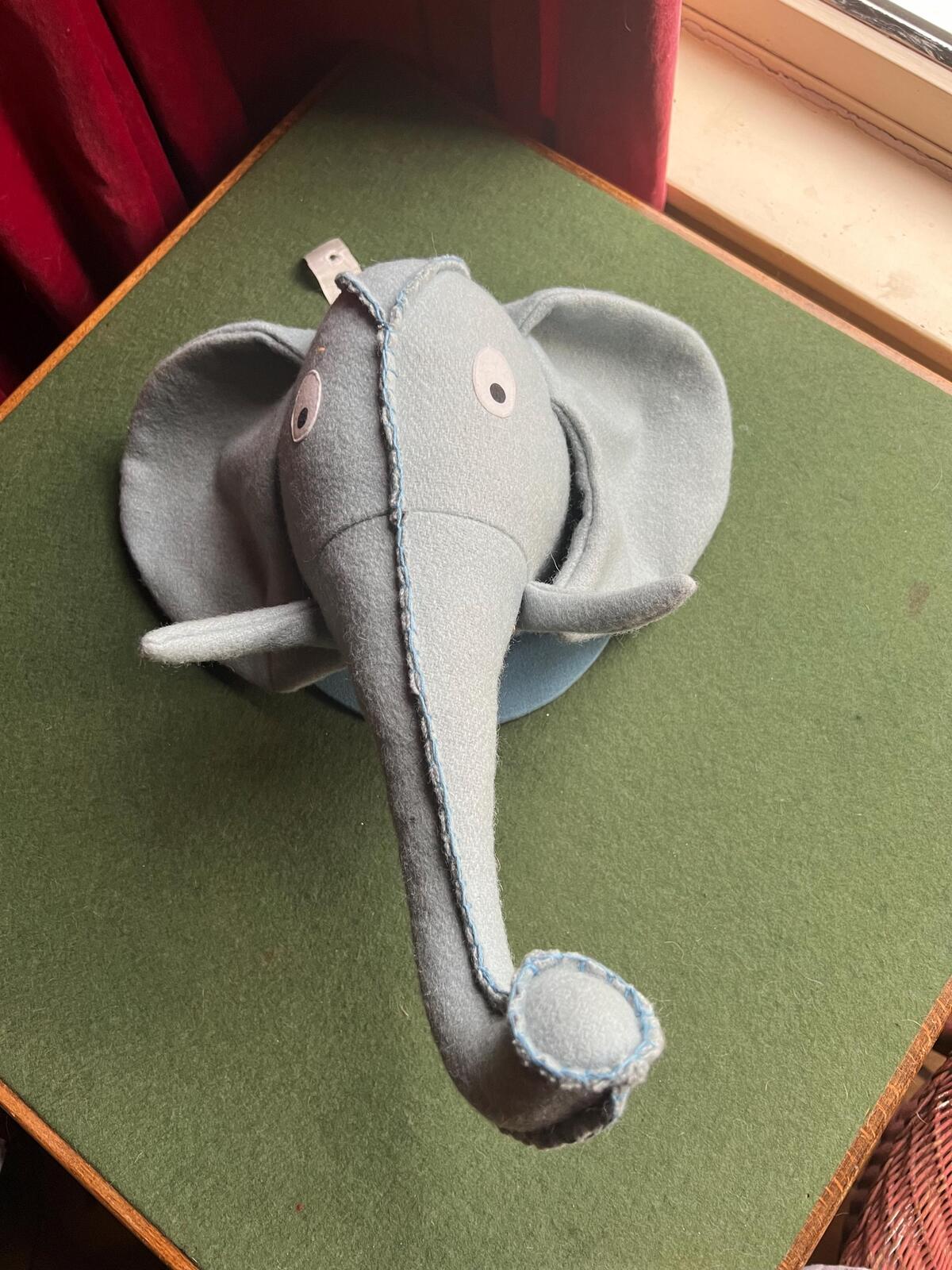 Felted elephant head wall decor for jungle nursery theme. Child's bedroom animal textile wall art.