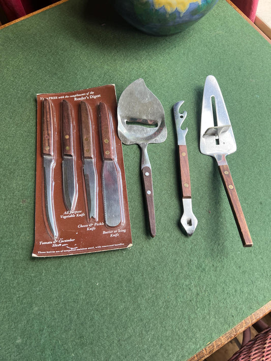 Set 1970s vintage serving flatware.Rosewood handled stainless steel.