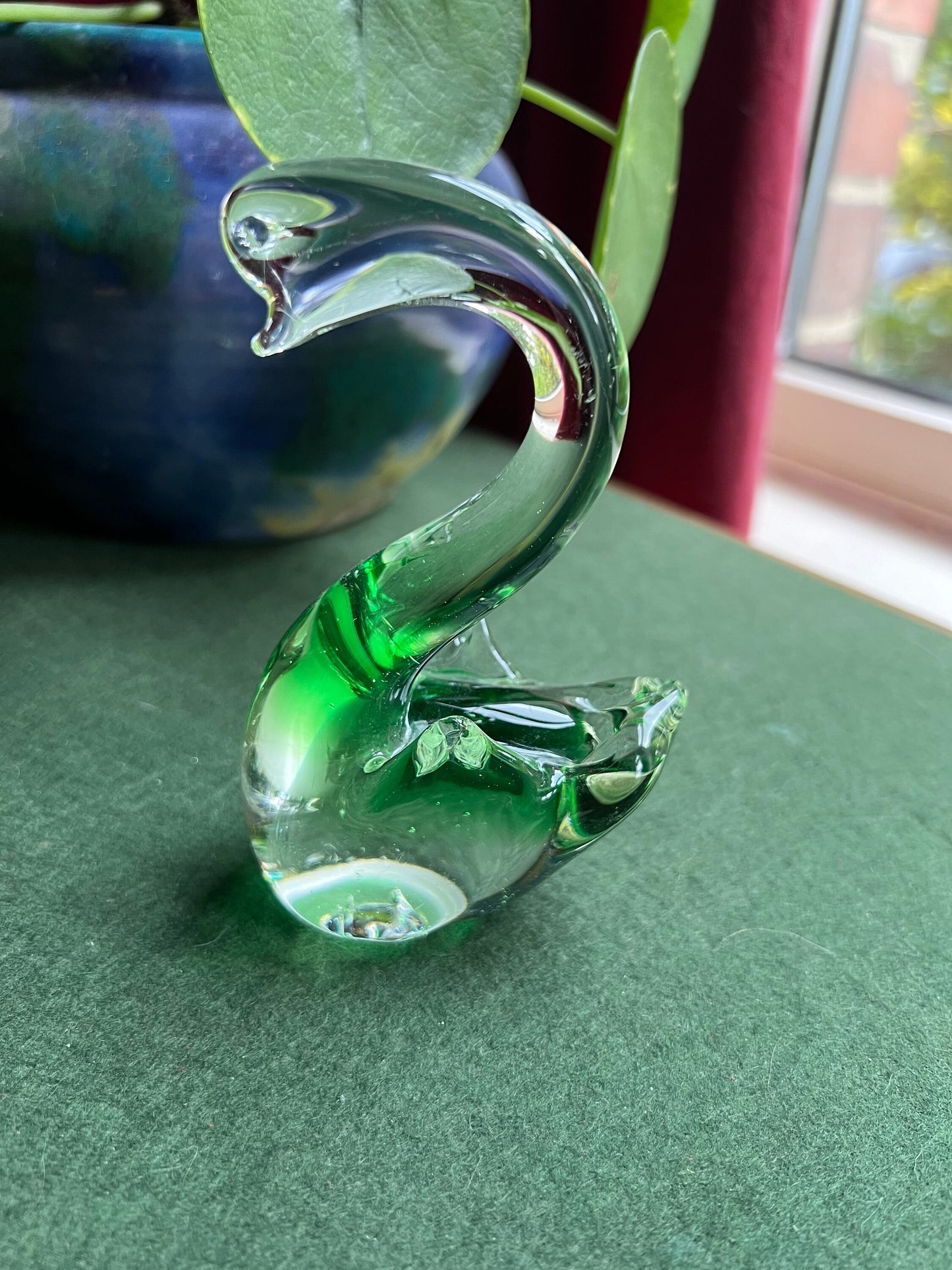 Beautiful hand blown green glass swan figurine.