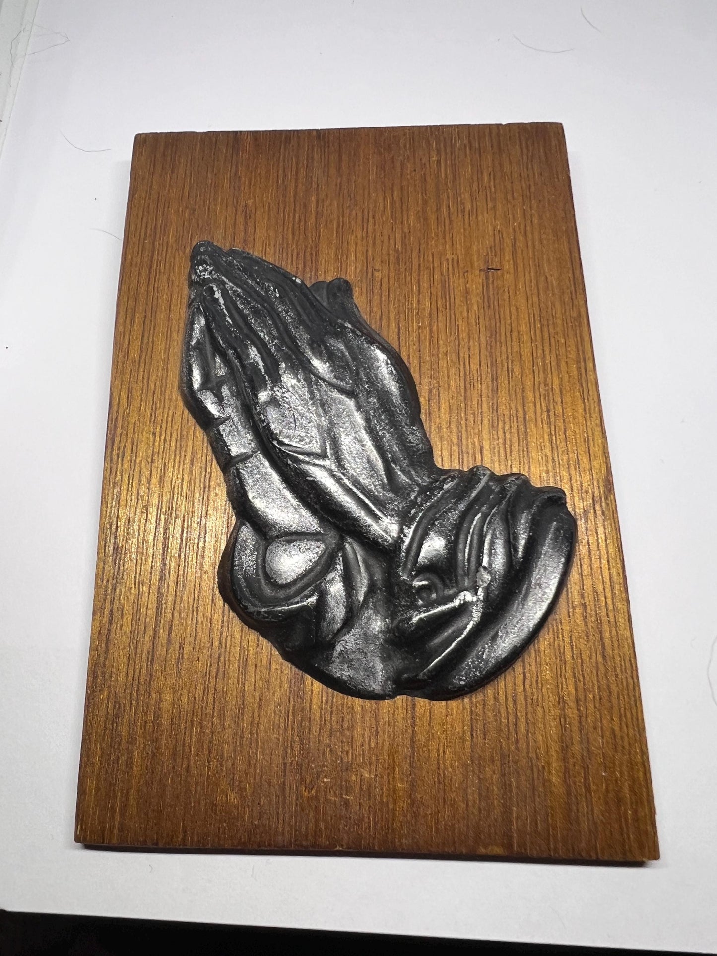 Praying Hand plaque. Kelham Crafts New Life Foundation Trust Newark Notts Uk.