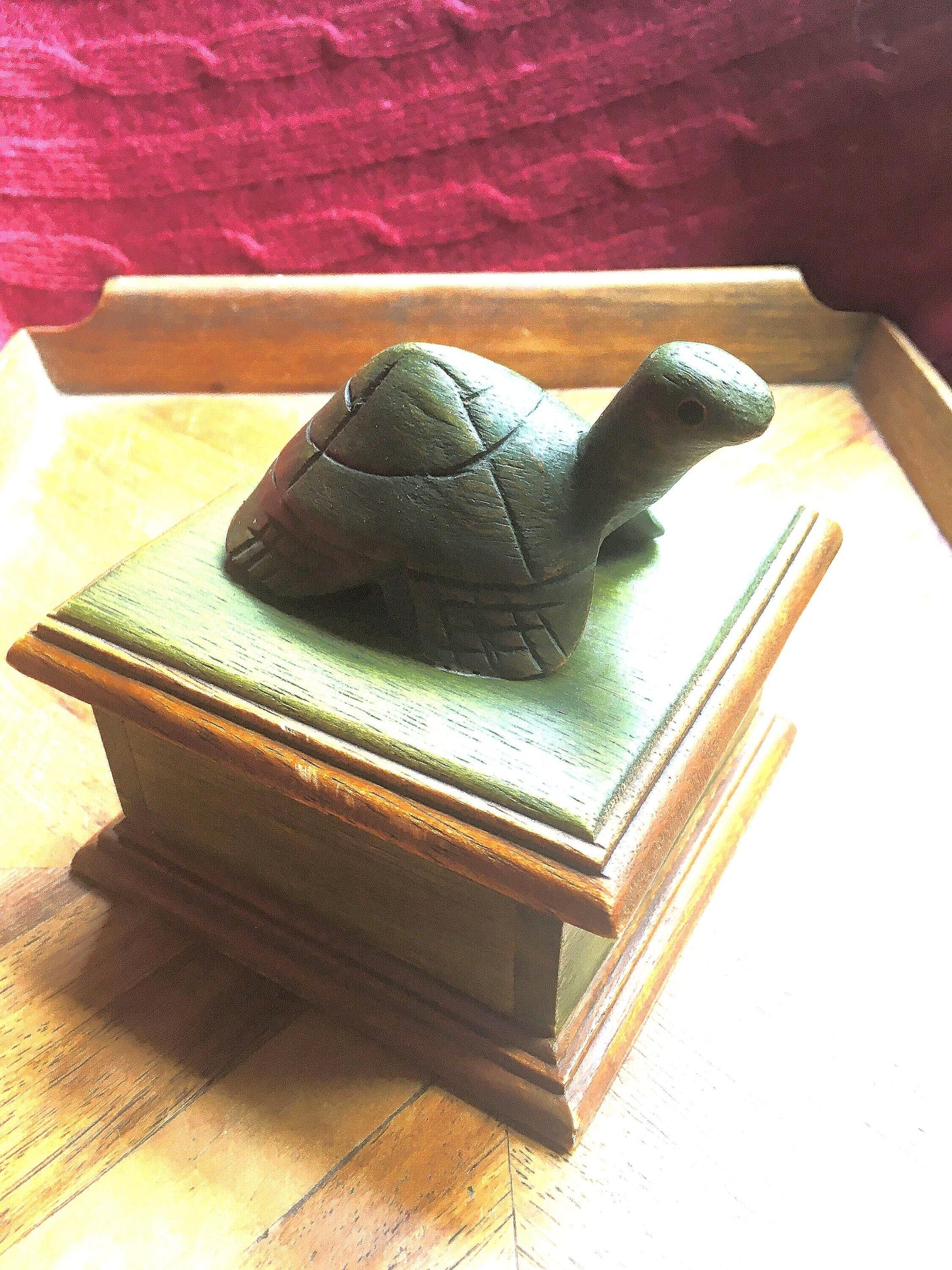 Hand-carved tortoise-lidded square wooden box. Made in Thailand.