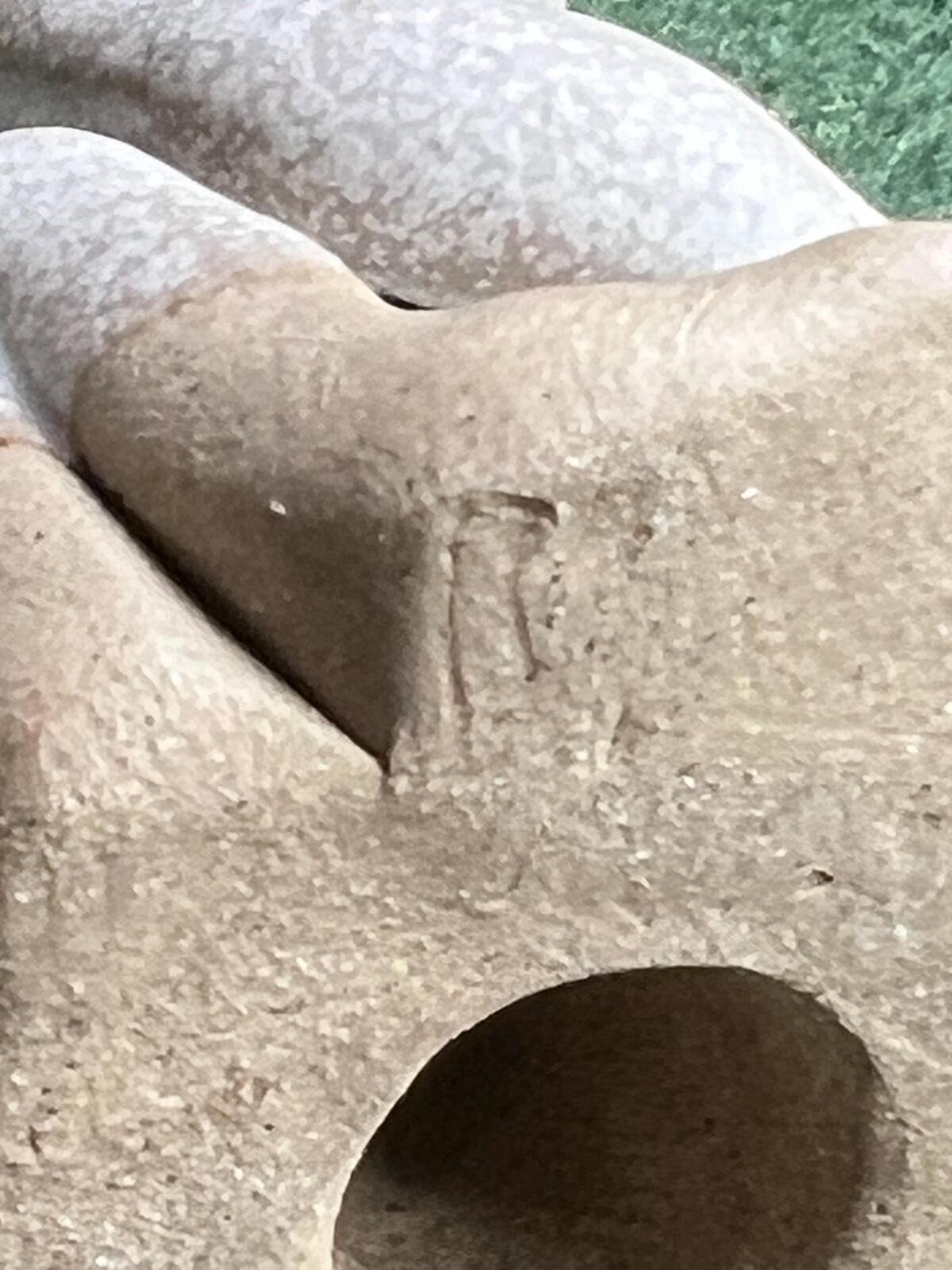 Hand built pottery dragon figurine. Grey clay ready to be painted dragon.