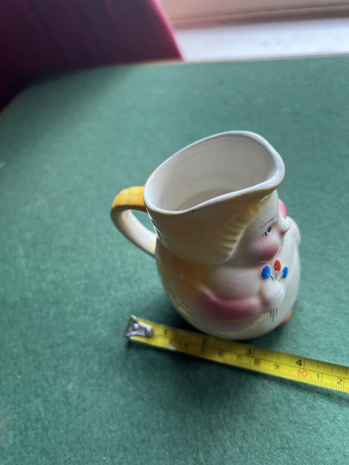 Erphila Czechoslovakia hand painted lady holding flowers vase milk jug.