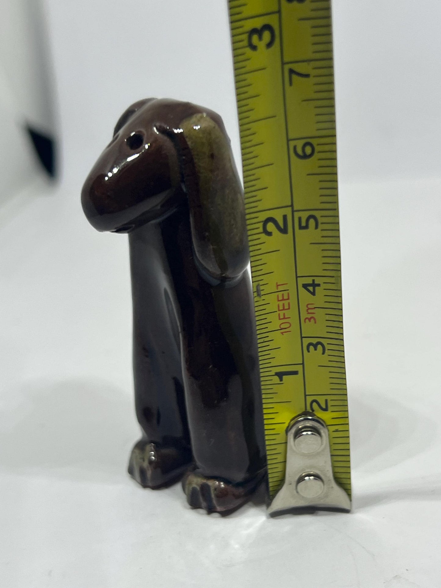 Tiny studio pottery dog figurine.