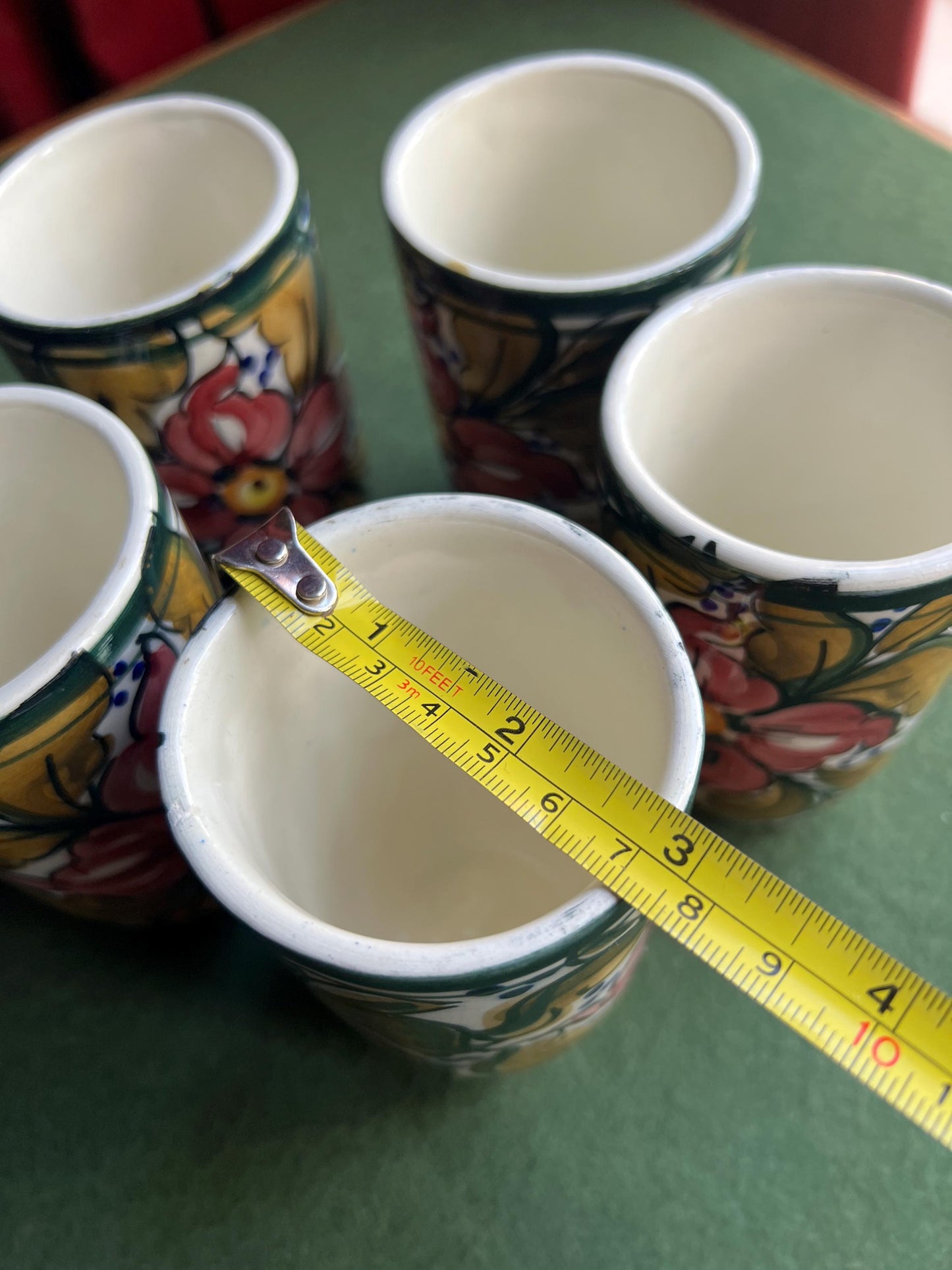 Set 5 ceramic studio pottery tumblers.