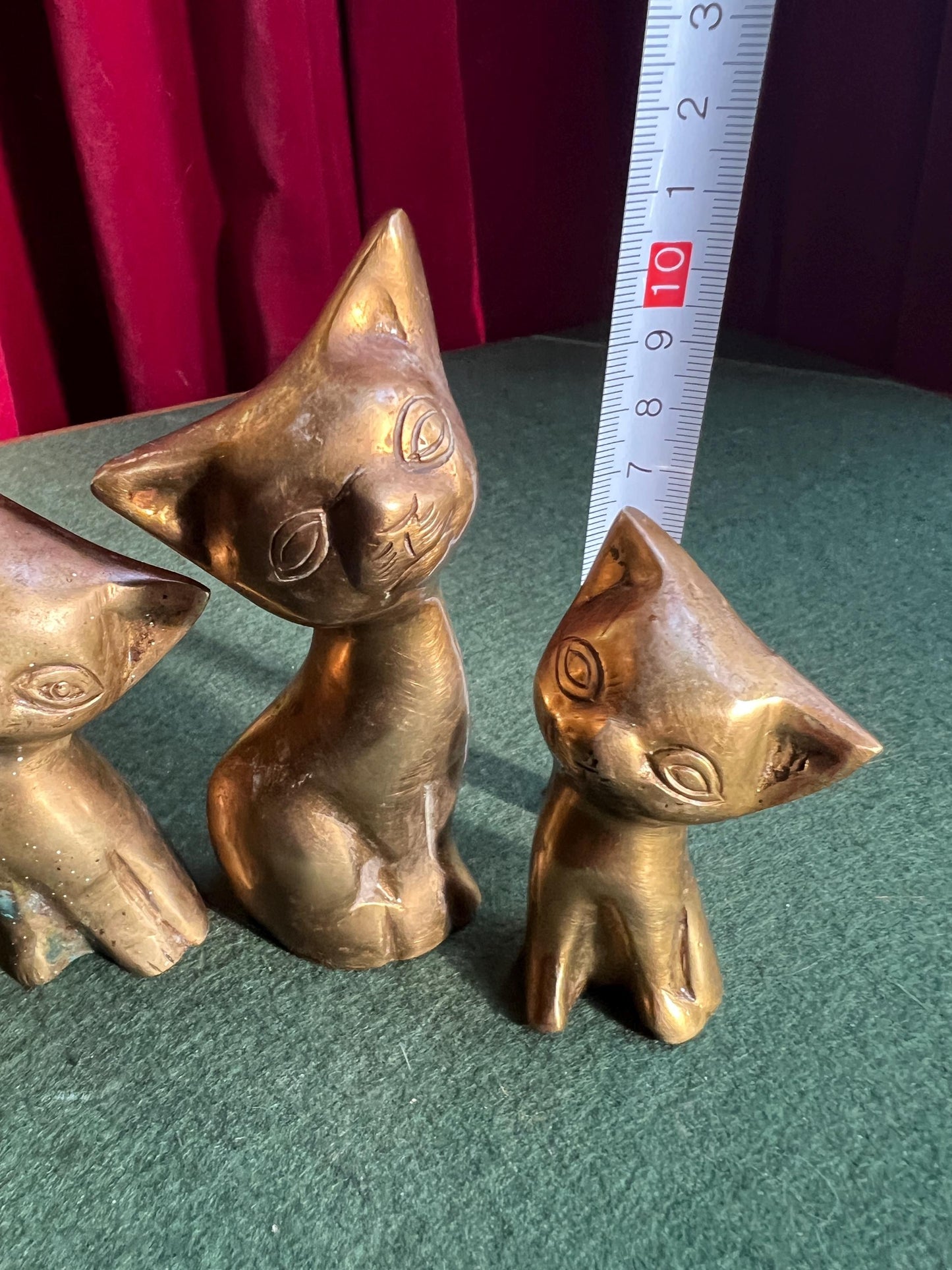 Vintage brass cat family. Quirky stylised mum cat and 2 kittens. Cat family paperweights.