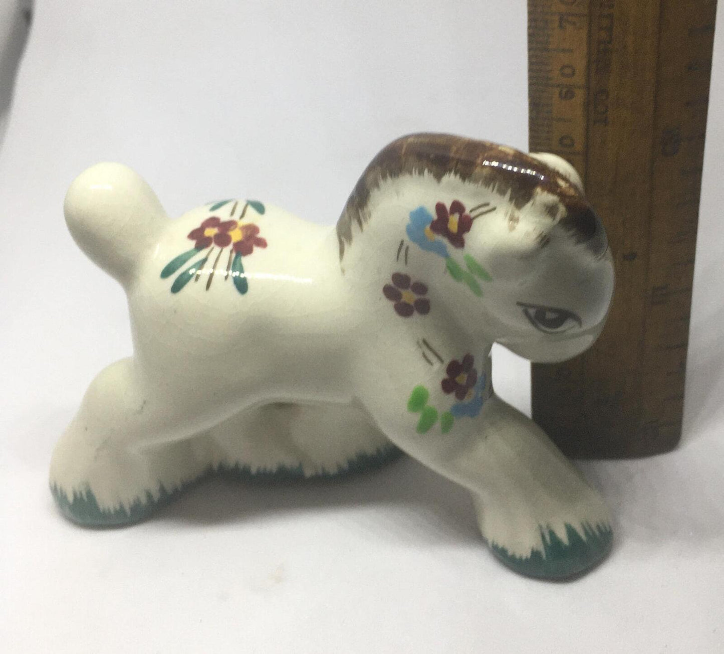 Folk art ceramic pony. Quirky hand-painted prancing ceramic pony.