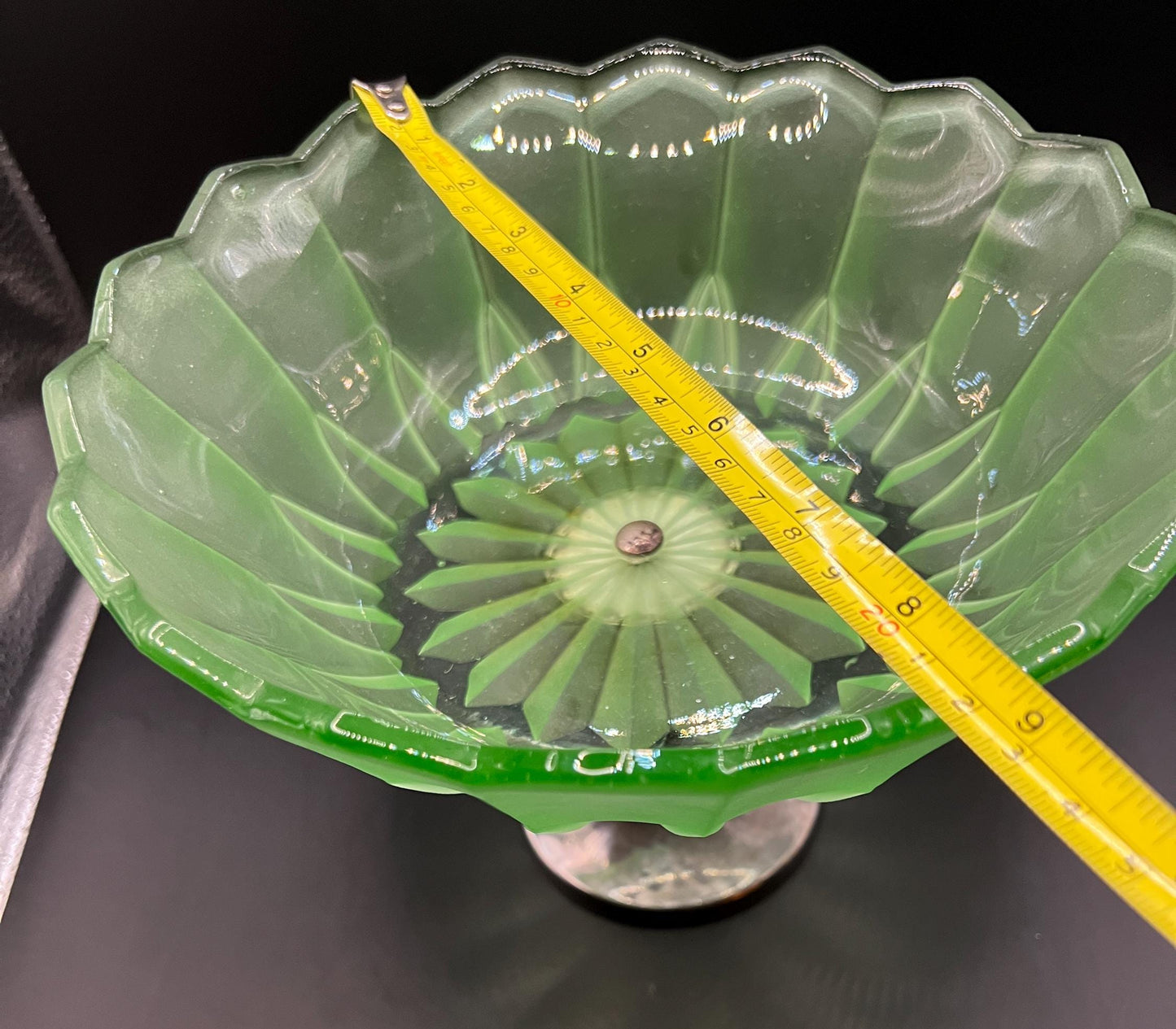 1930s green stretch glass pedestal bowl on silver tone base.
