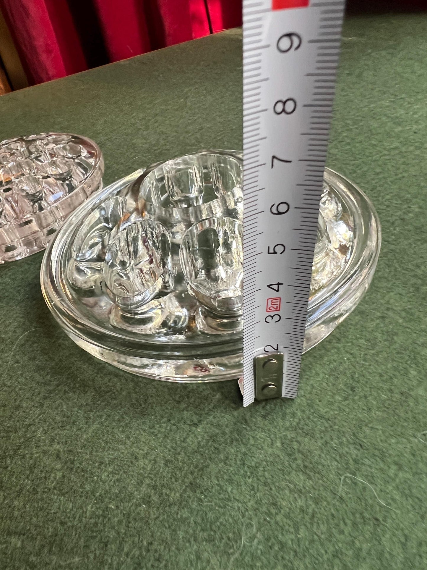 Vintage clear glass flower frogs. 2 available Sold separately.