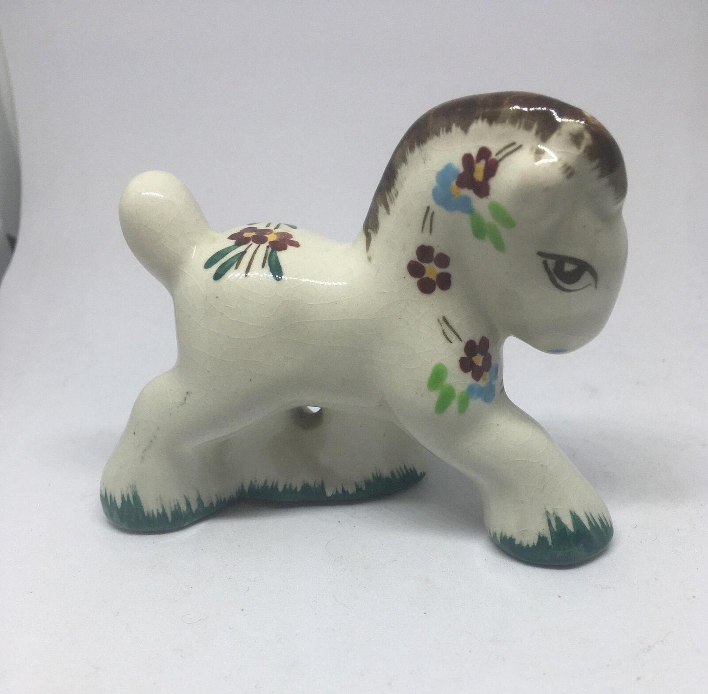 Folk art ceramic pony. Quirky hand-painted prancing ceramic pony.