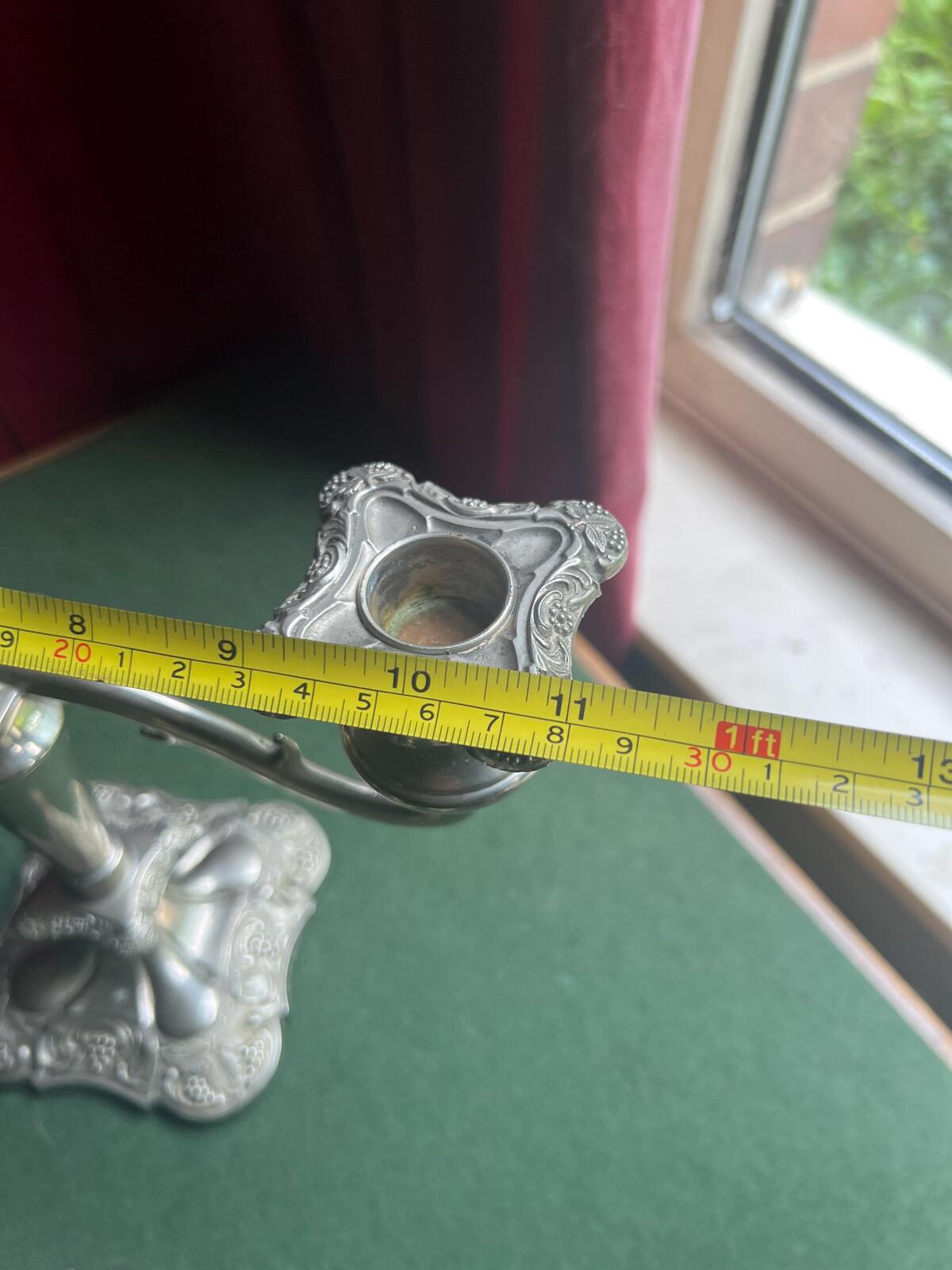 Pair of Vintage antique candlestick holders. Grape and vine pattern silver plated 3 arm candle holders. Mismatched heights.