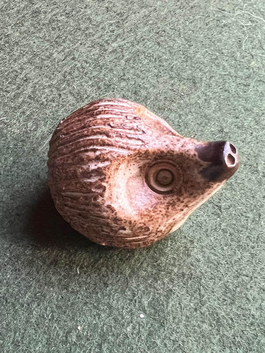 Miniature hedgehog figurine. 1970s Studio pottery hoglet ornament.