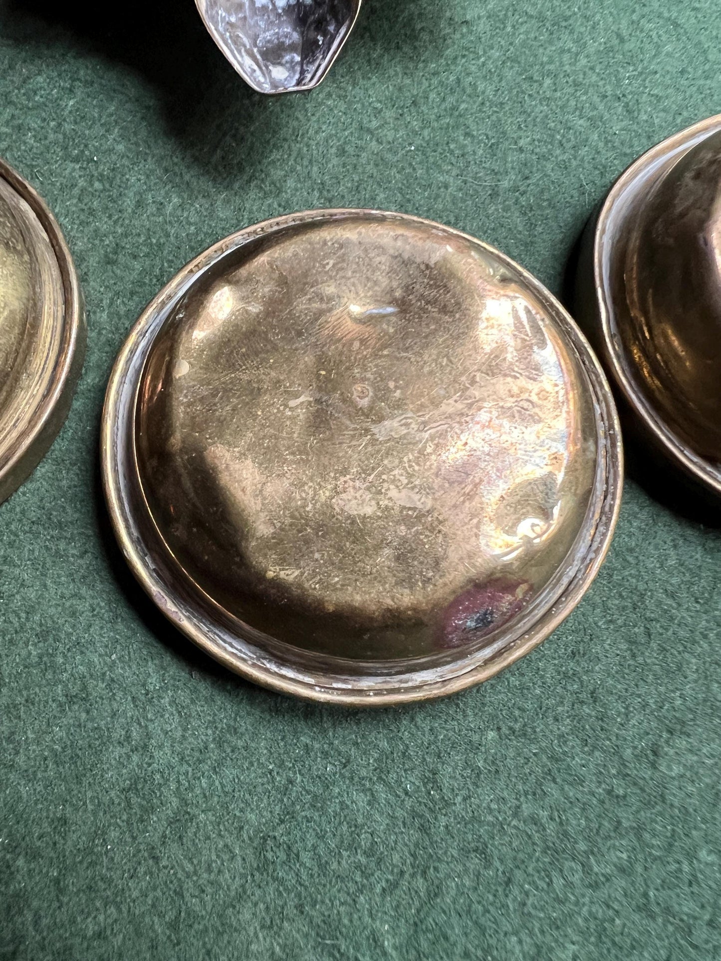 Quirky enamel brass stacking ashtrays on tortoise base.