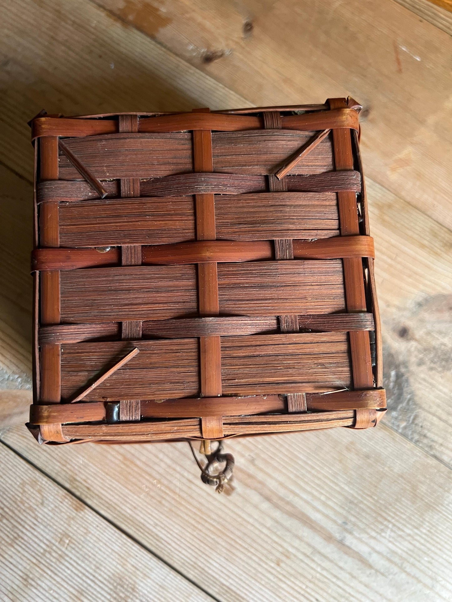 Vintage bamboo hand woven sewing basket. Green satin lined small lidded sewing basket.