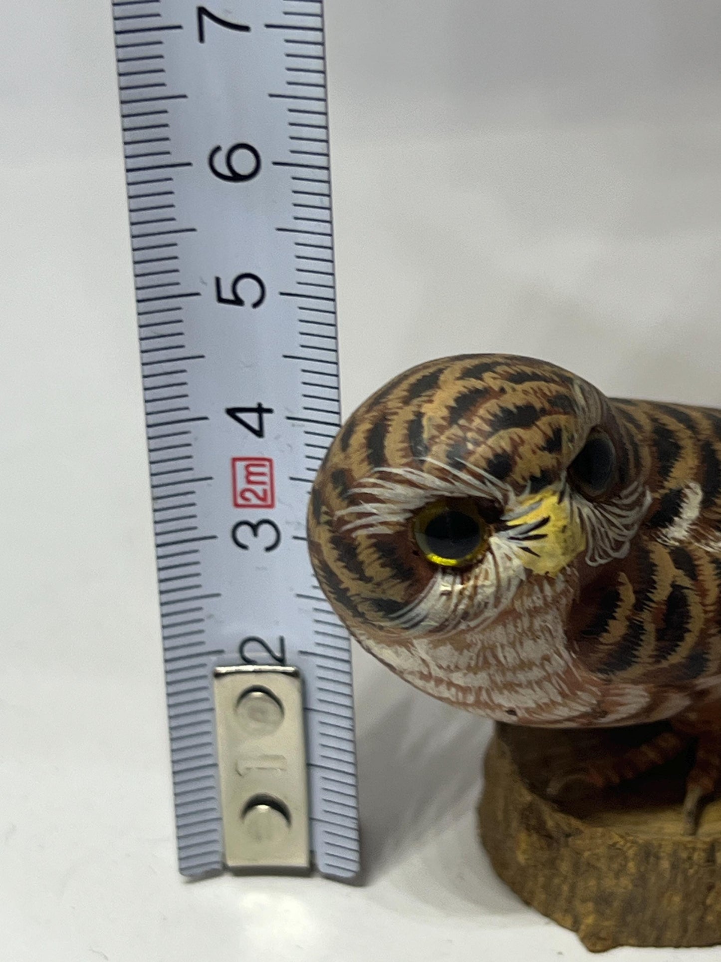 Vintage Hand Carved Wood Saw Whet Owl Hand painted with glass eyes on tree stump base.