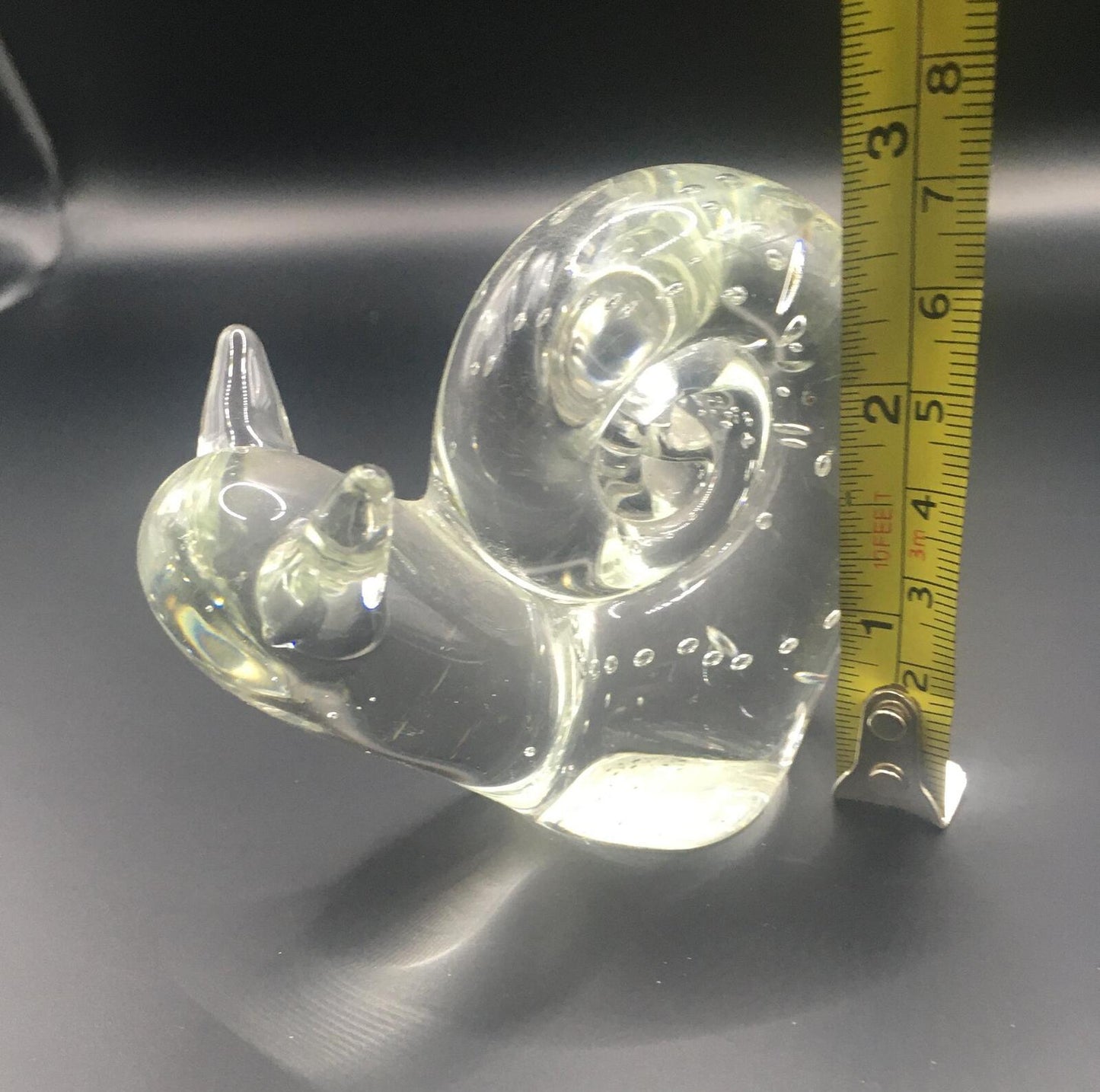 Art glass snail paperweight figurine . Cute clear glass snail with bubbles.
