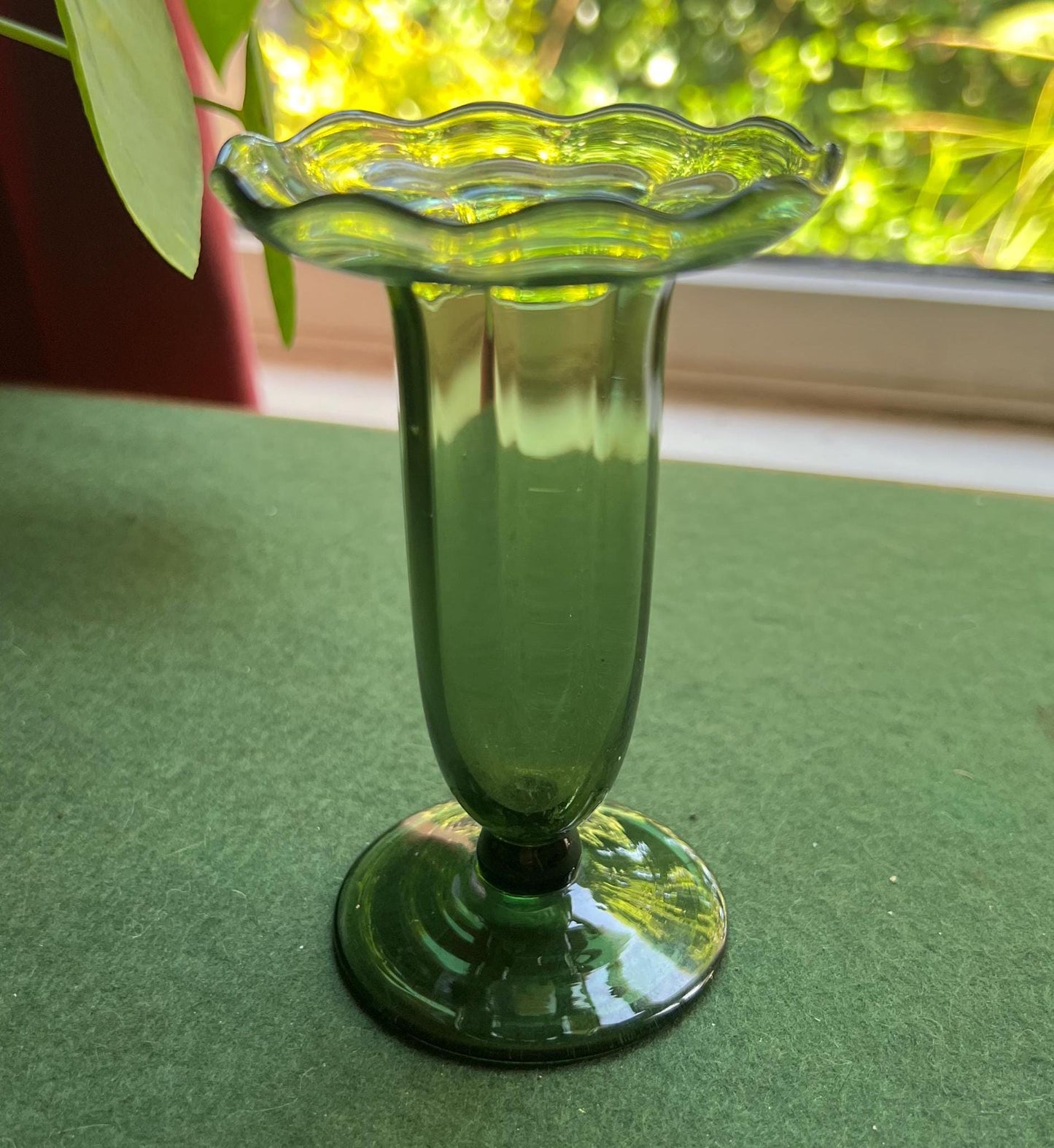 Green glass vase.
