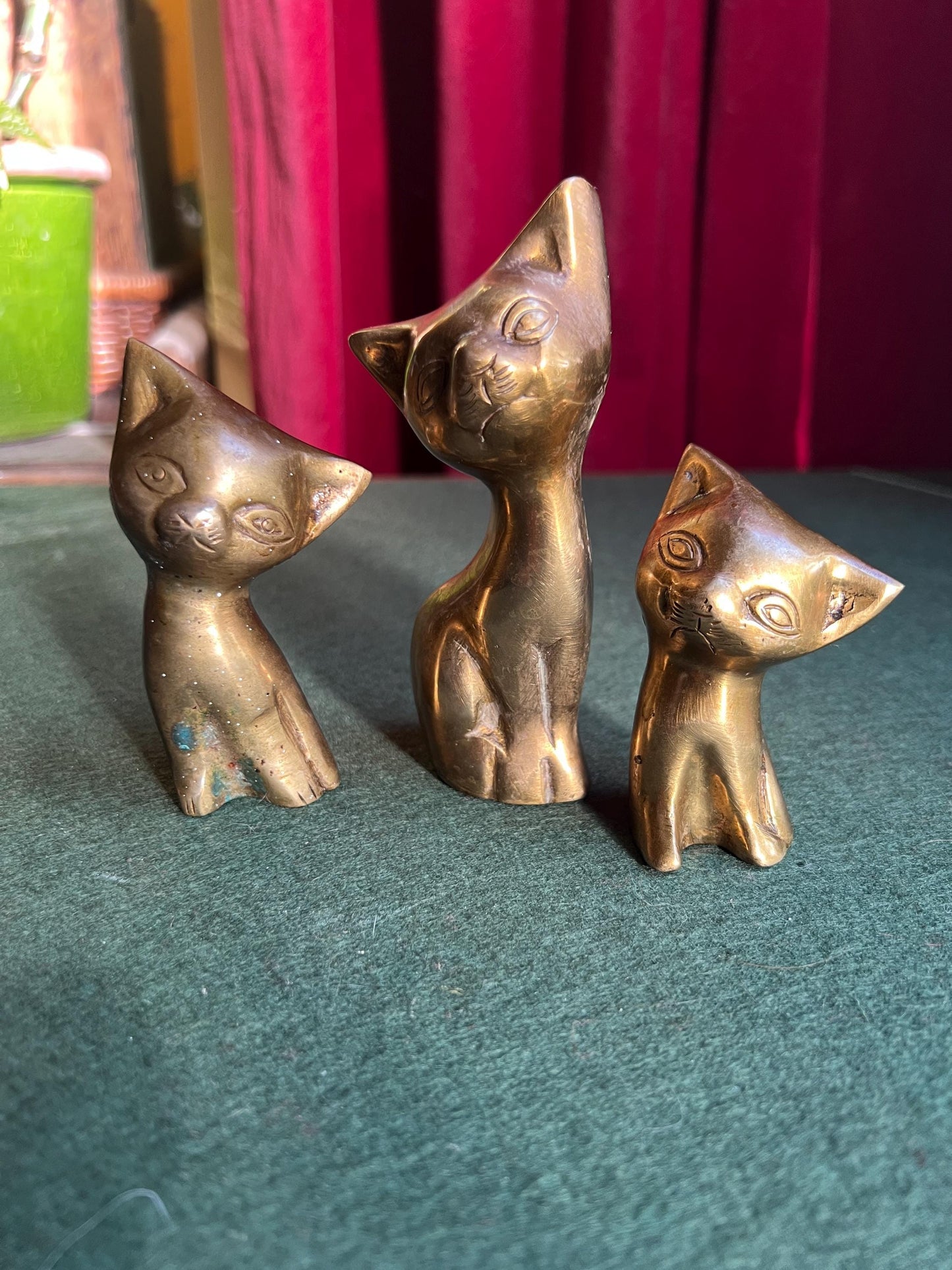 Vintage brass cat family. Quirky stylised mum cat and 2 kittens. Cat family paperweights.