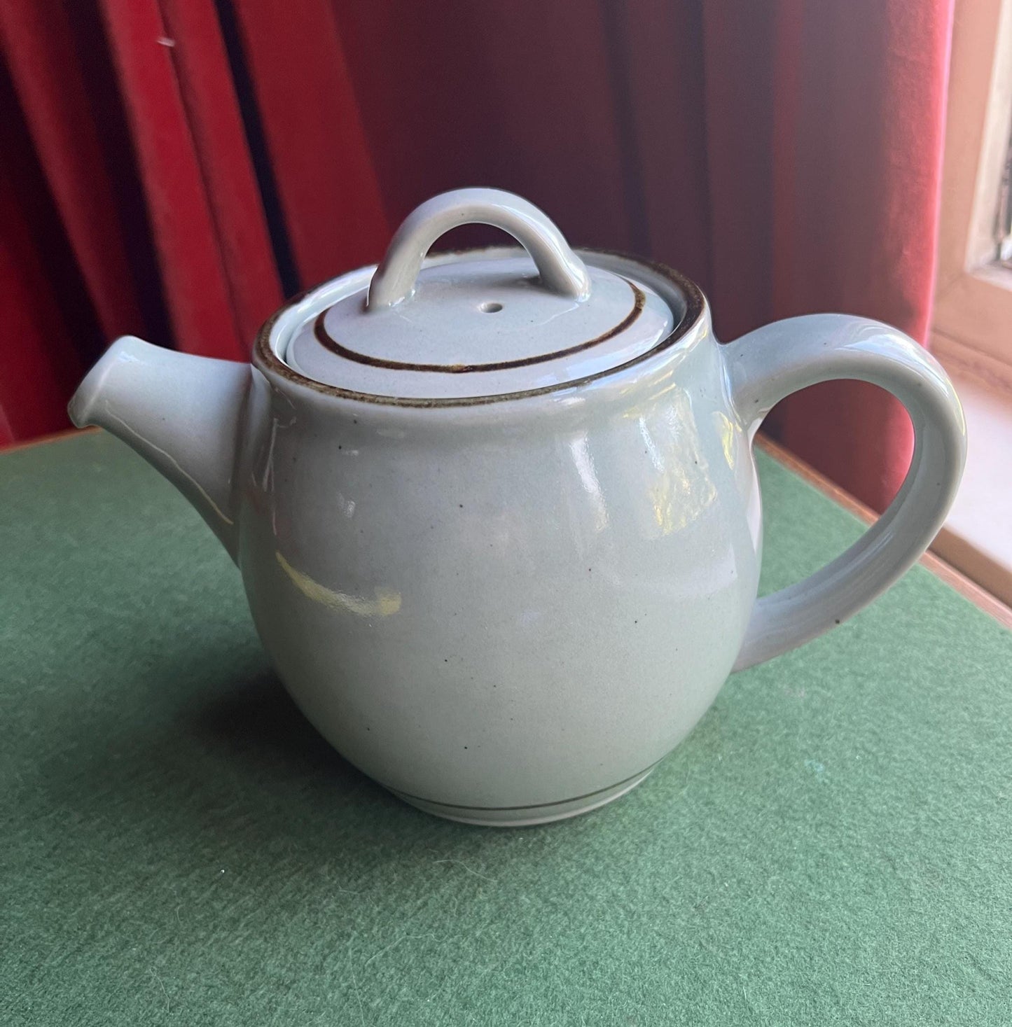 Pot bellied celadon glazed tea coffee pot. Speckled duck egg blue. Stamped Highland Stoneware Scotland.