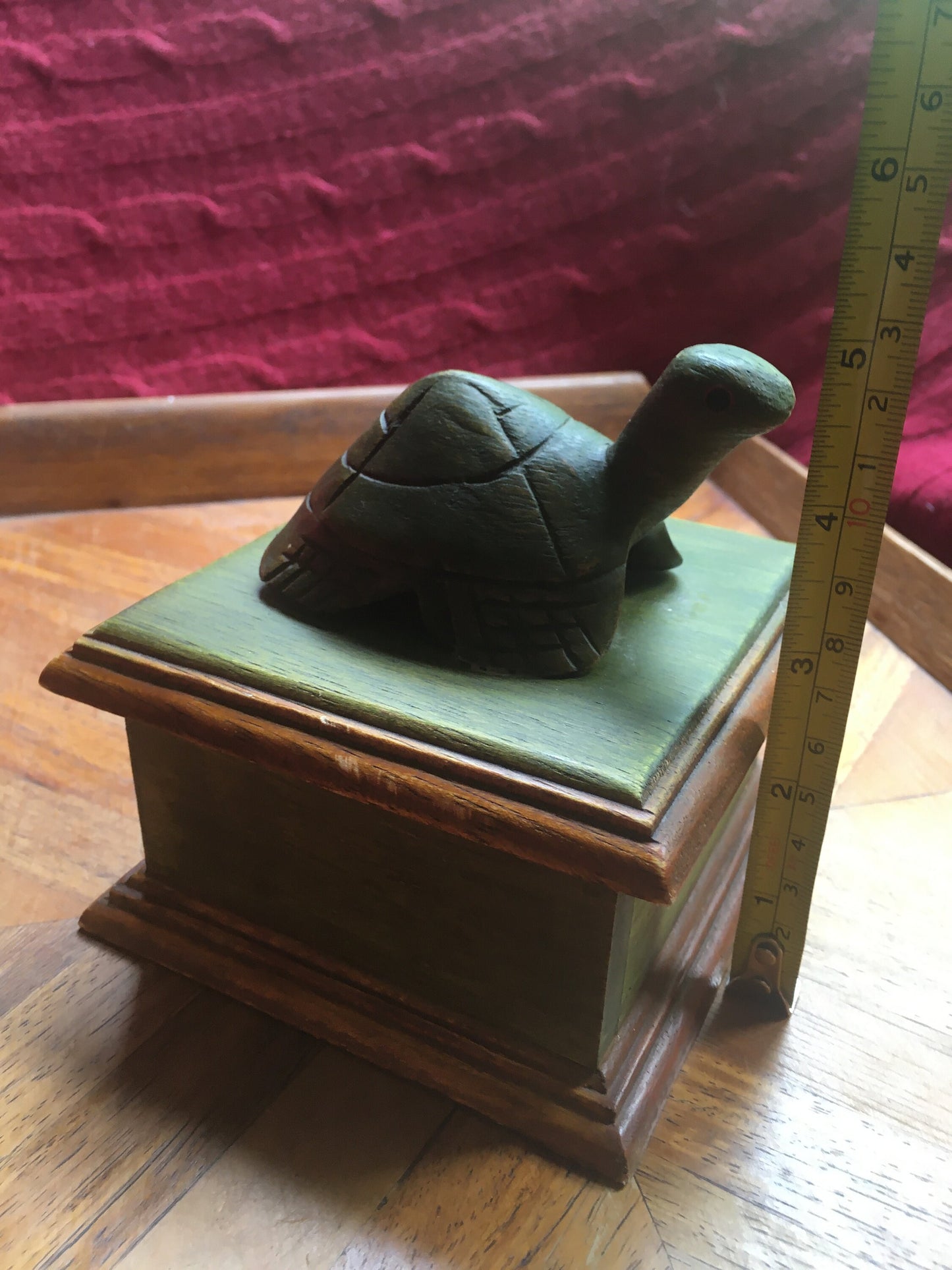 Hand-carved tortoise-lidded square wooden box. Made in Thailand.