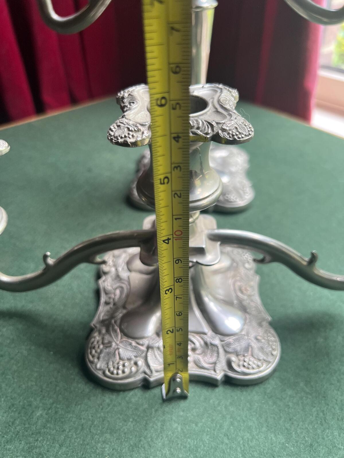 Pair of Vintage antique candlestick holders. Grape and vine pattern silver plated 3 arm candle holders. Mismatched heights.