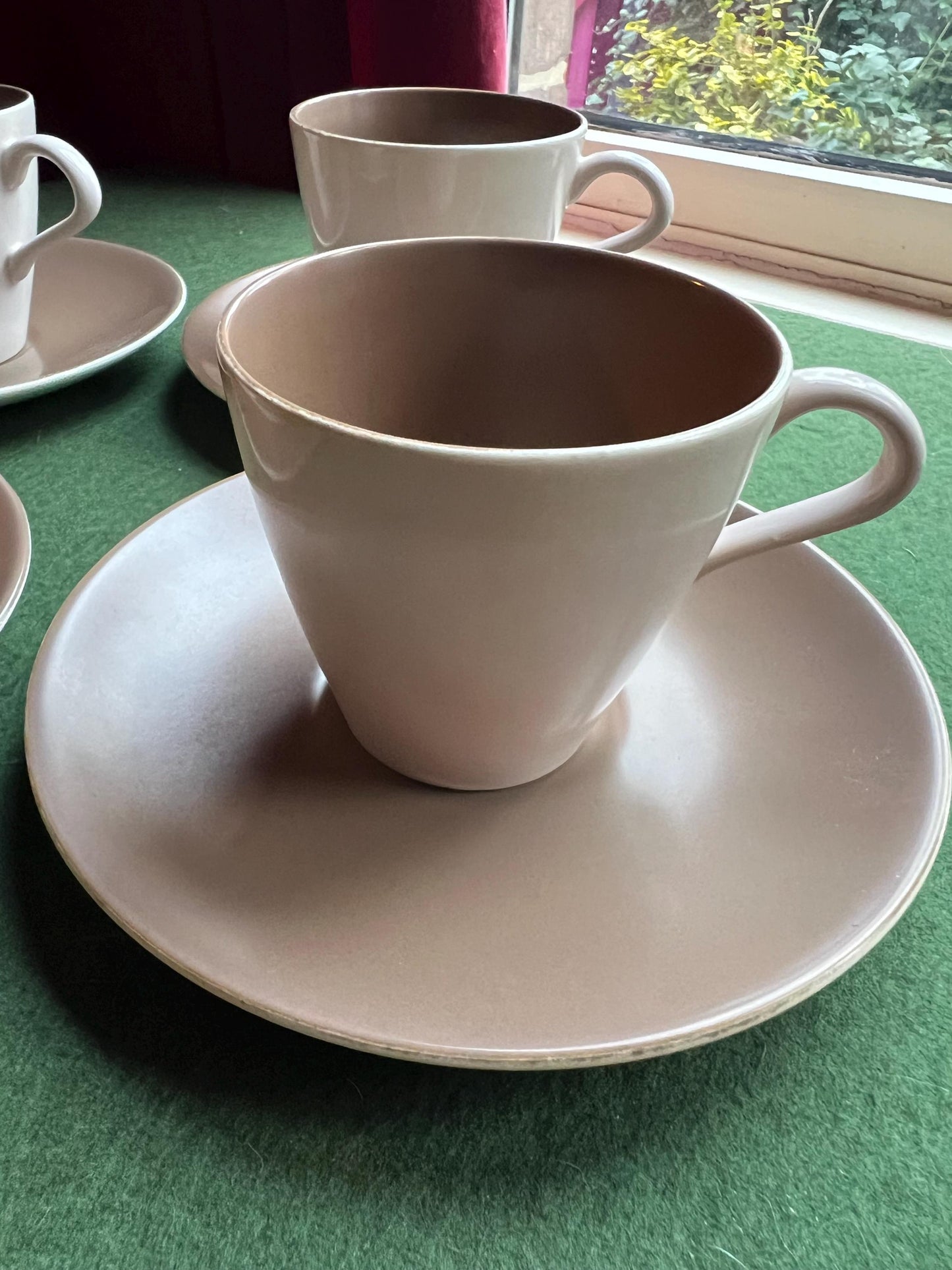 Poole Pottery two tone mushroom brown set of four espresso cups and saucers.