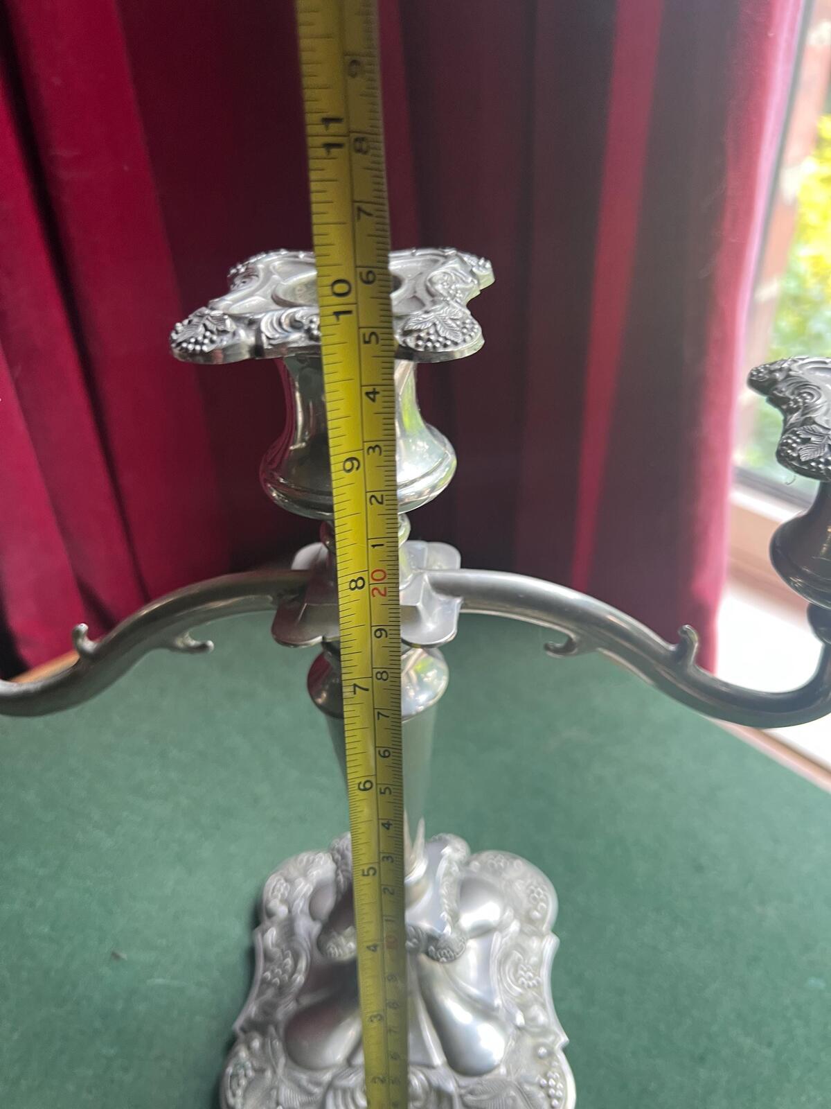Pair of Vintage antique candlestick holders. Grape and vine pattern silver plated 3 arm candle holders. Mismatched heights.