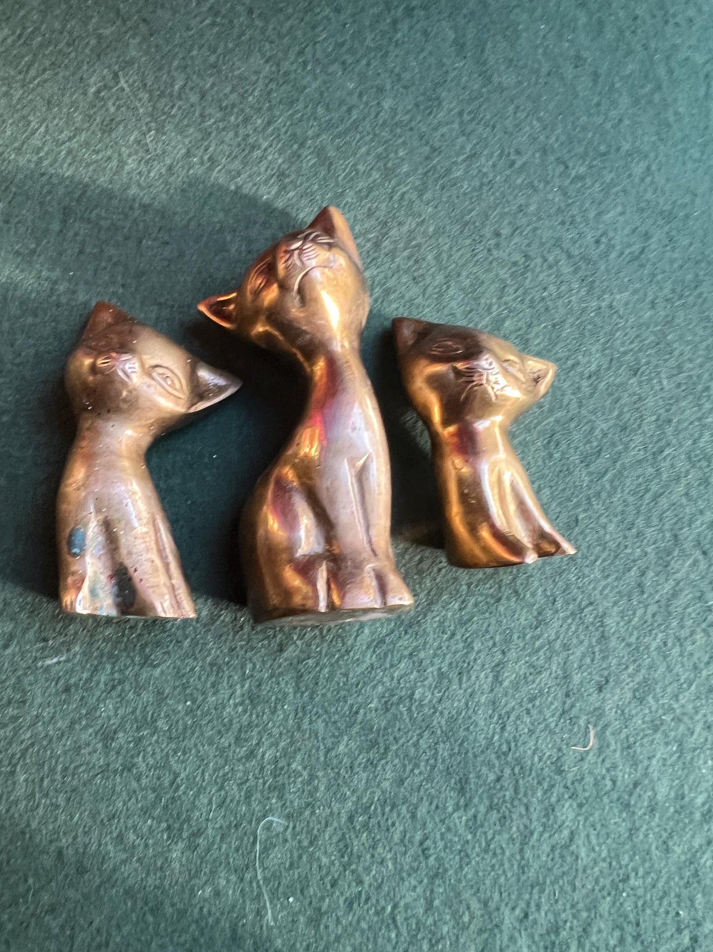 Vintage brass cat family. Quirky stylised mum cat and 2 kittens. Cat family paperweights.