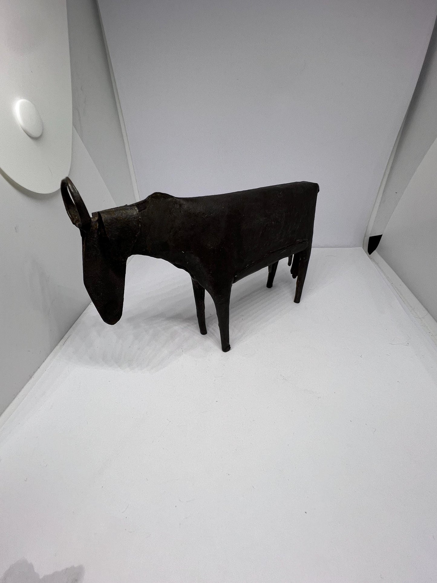 Brutalist metal cow sculpture.  Iron abstract folk art figurine.