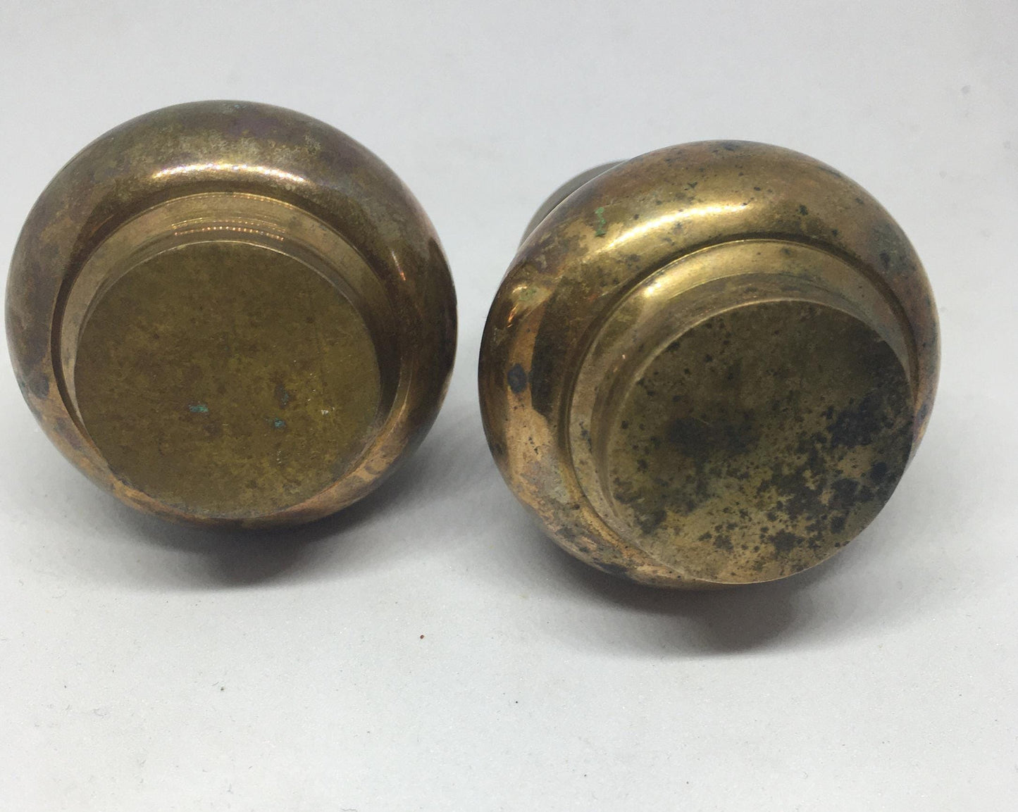 Unusual brass salt and pepper shakers. Screw off lids plastic inserts. Some oxidation.