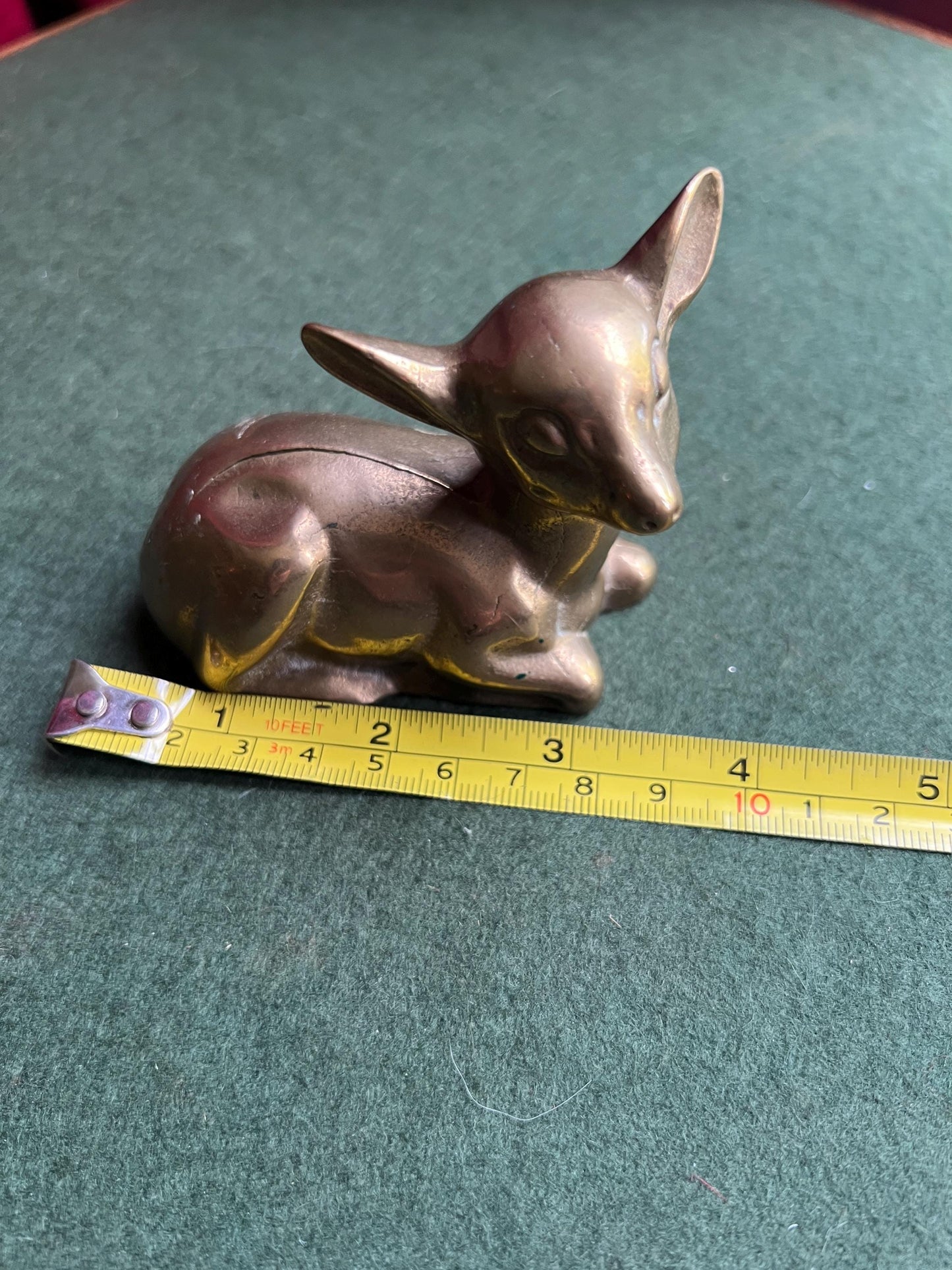 Vintage brass deer figurine. Resting fawn brass paperweight.