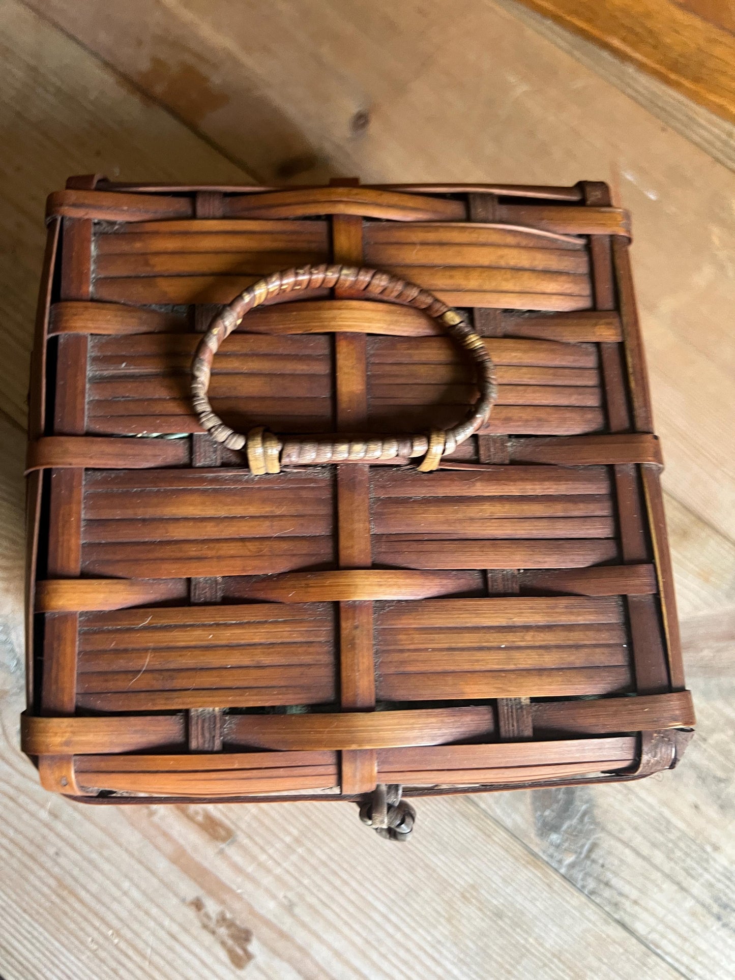 Vintage bamboo hand woven sewing basket. Green satin lined small lidded sewing basket.