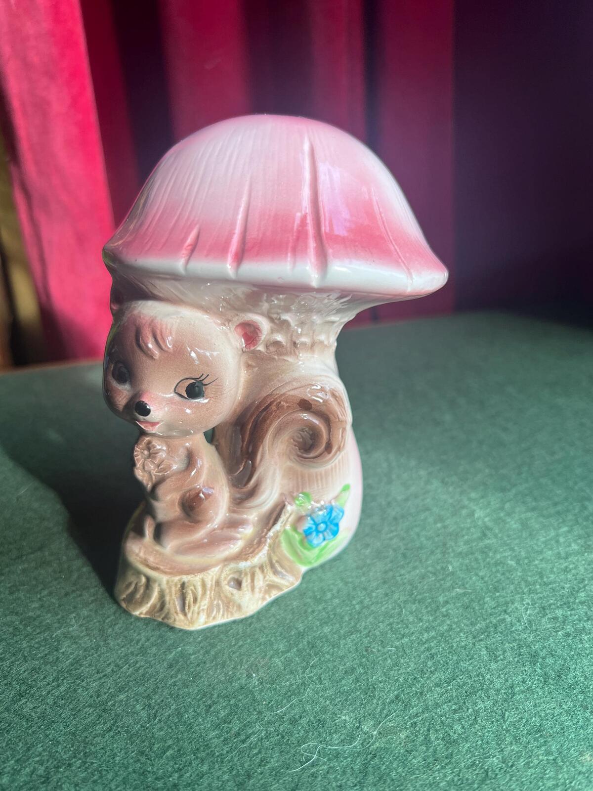 Quirky Squirrel money bank. Kitsch anthropomorphic squirrel sitting under a pink mushroom. MC decor.