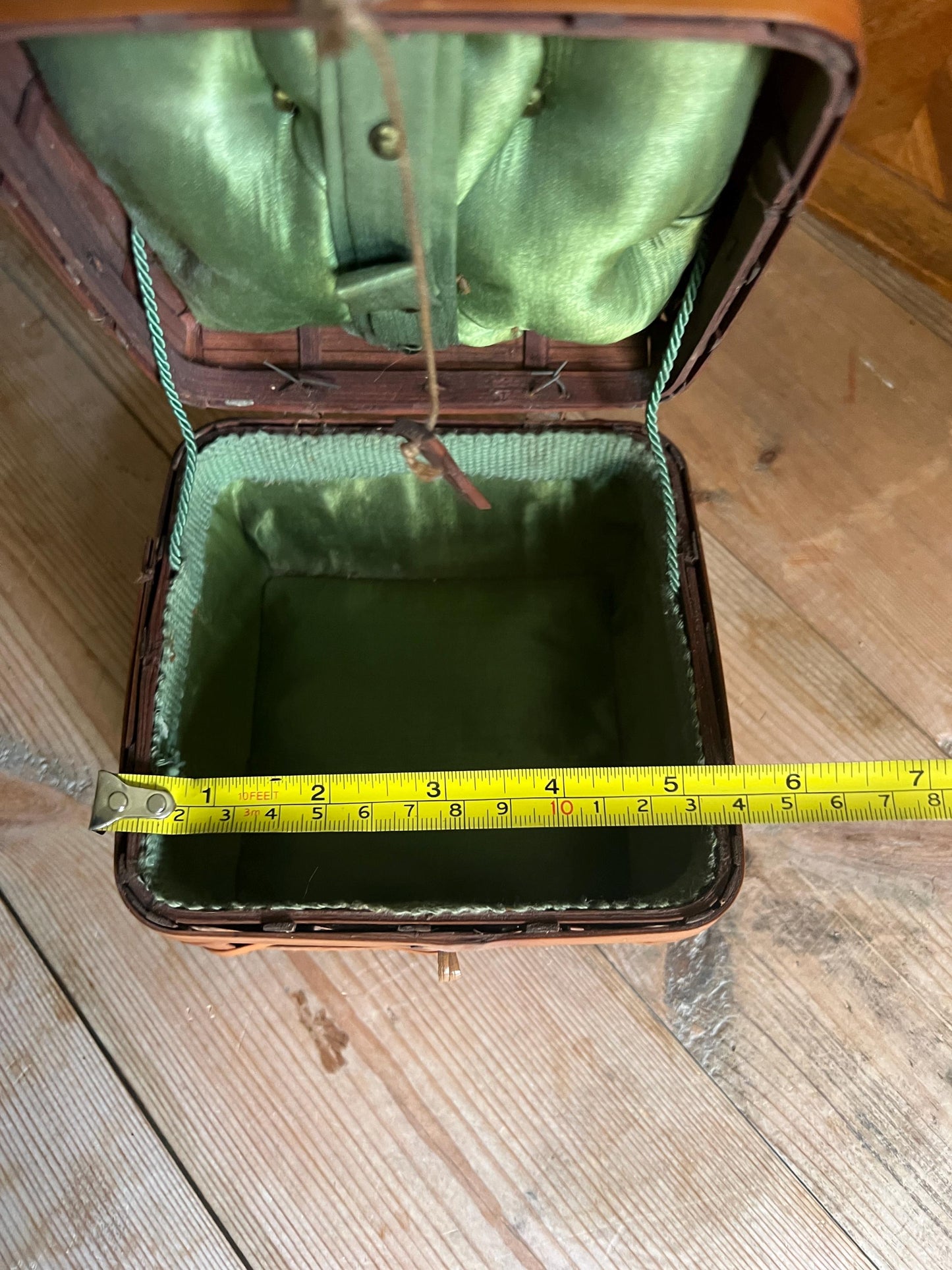 Vintage bamboo hand woven sewing basket. Green satin lined small lidded sewing basket.