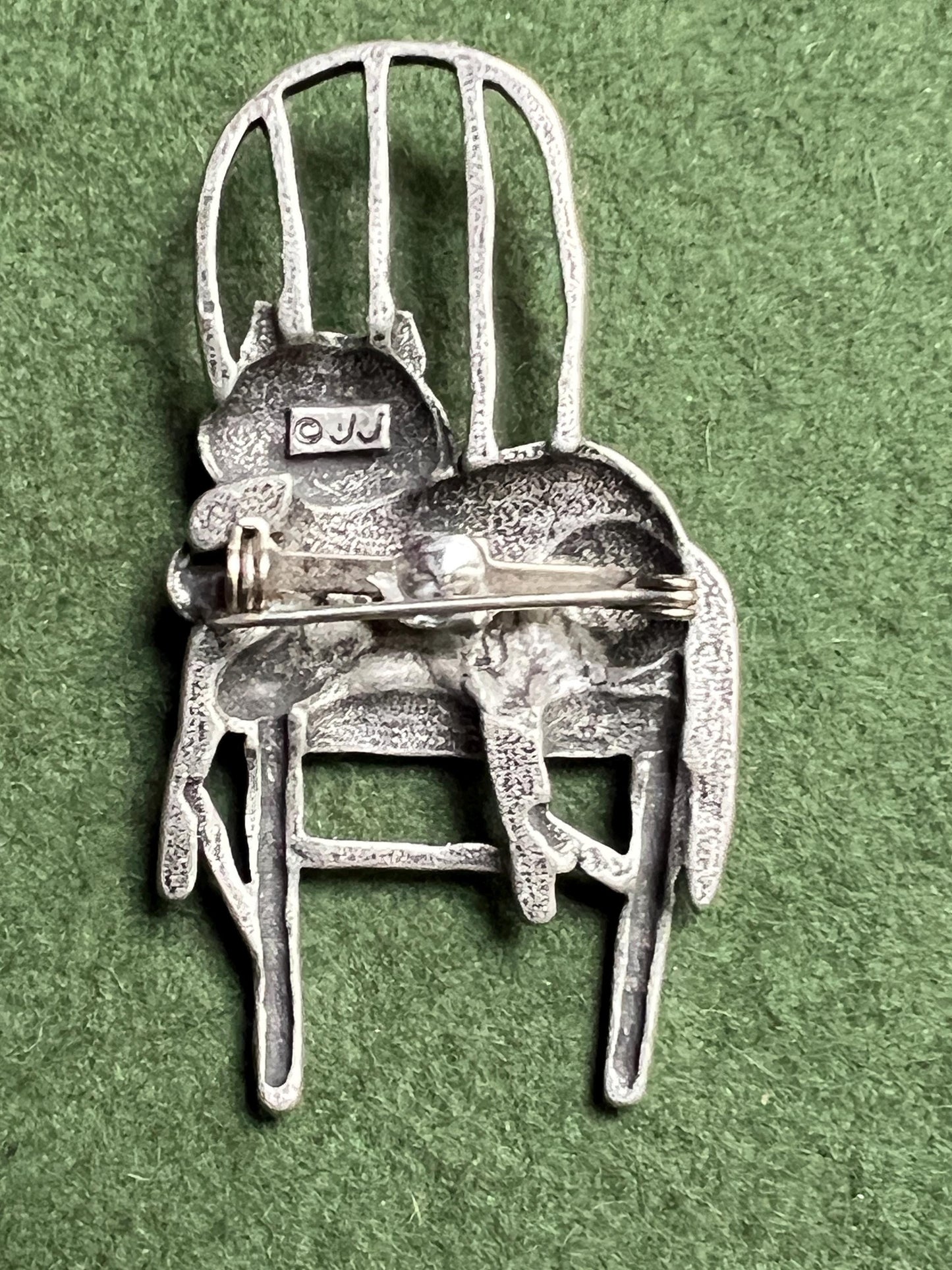 Vintage Cat brooch Signed JJ. Grinning Cheshire Cat sitting on a chair.
