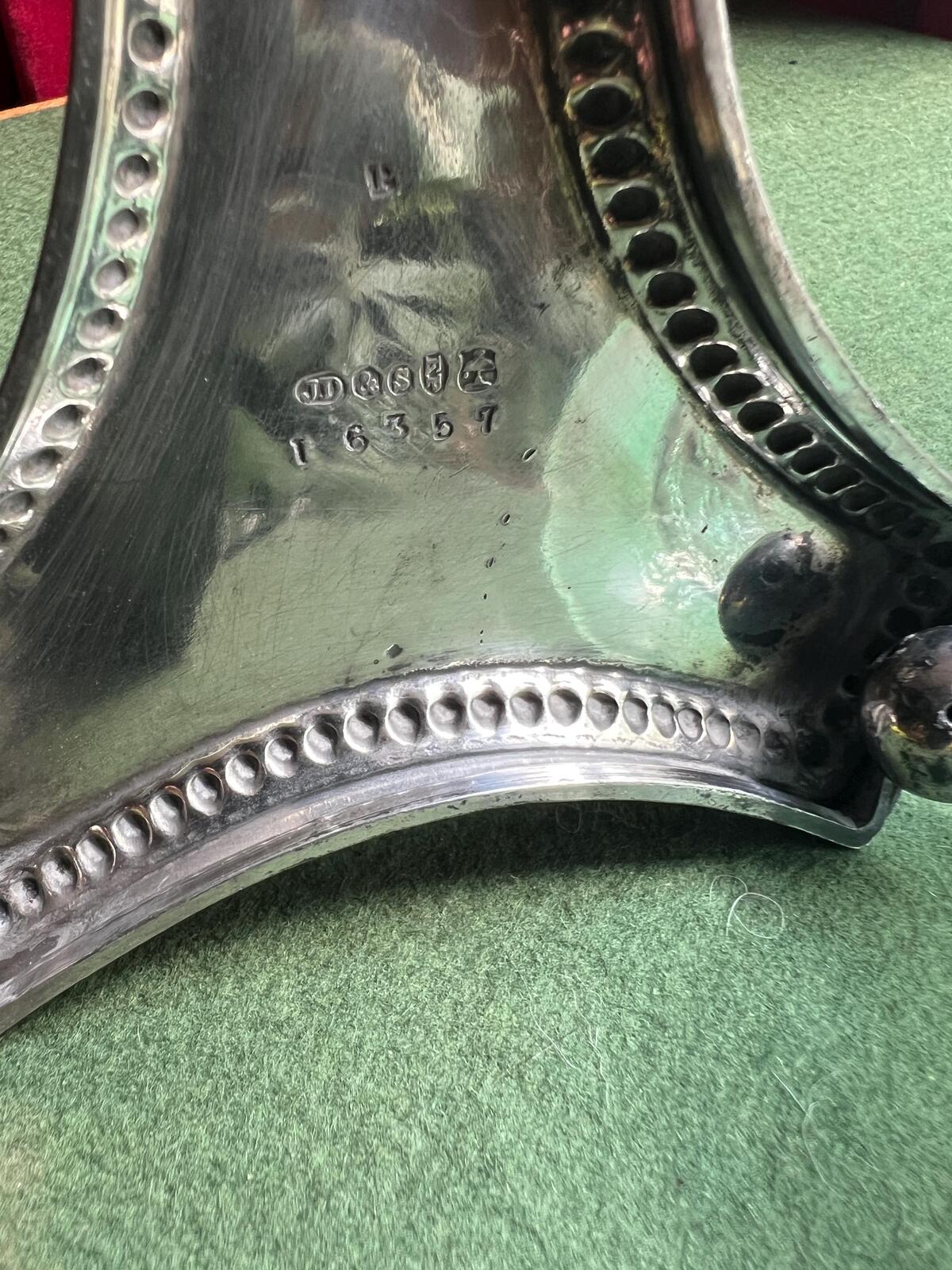 Victorian epergne vase. Green glass on decorative silver plate base. Stamped James Dixon & Sons.